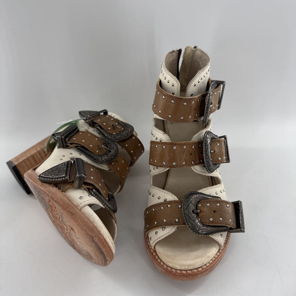 7 studded buckle accents heeled booties