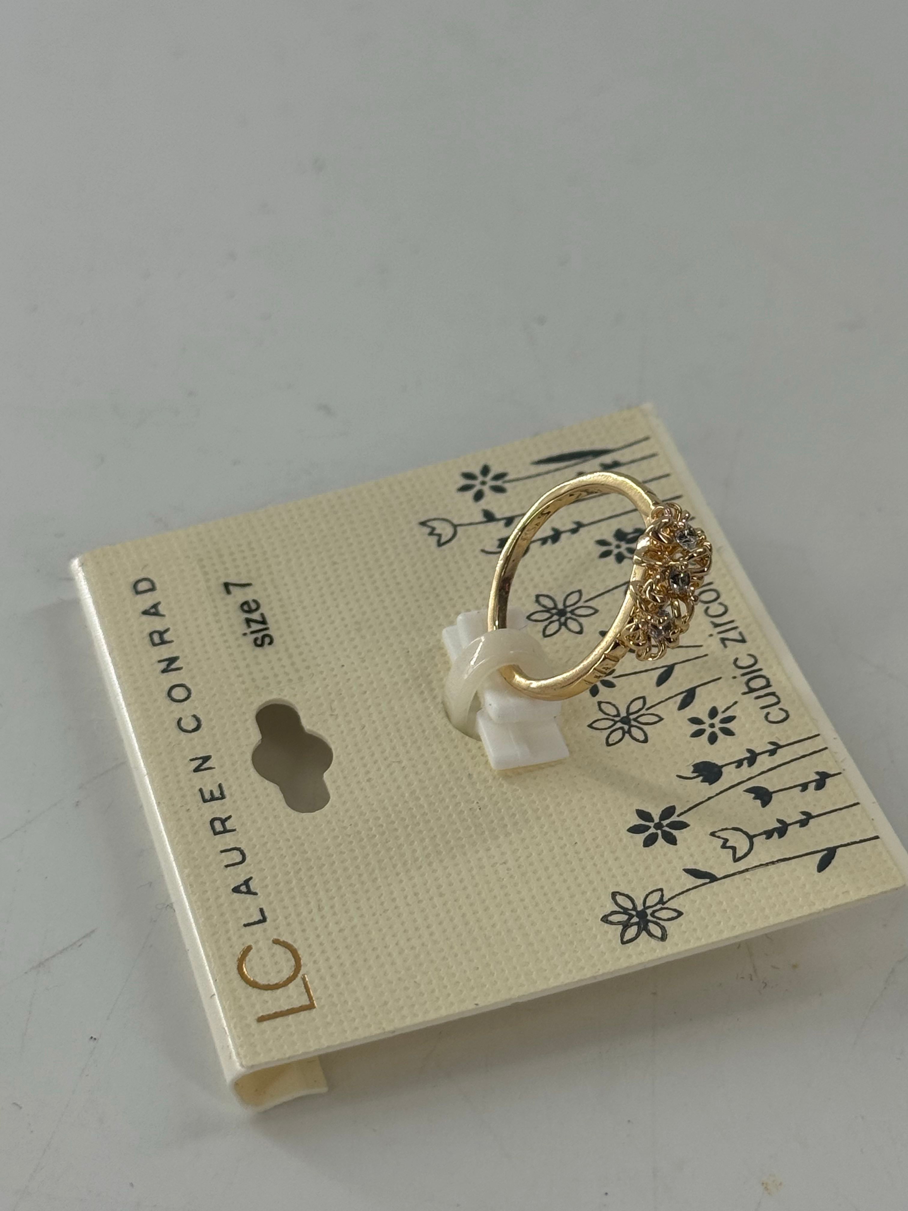 sz 7 gold cz flo ring