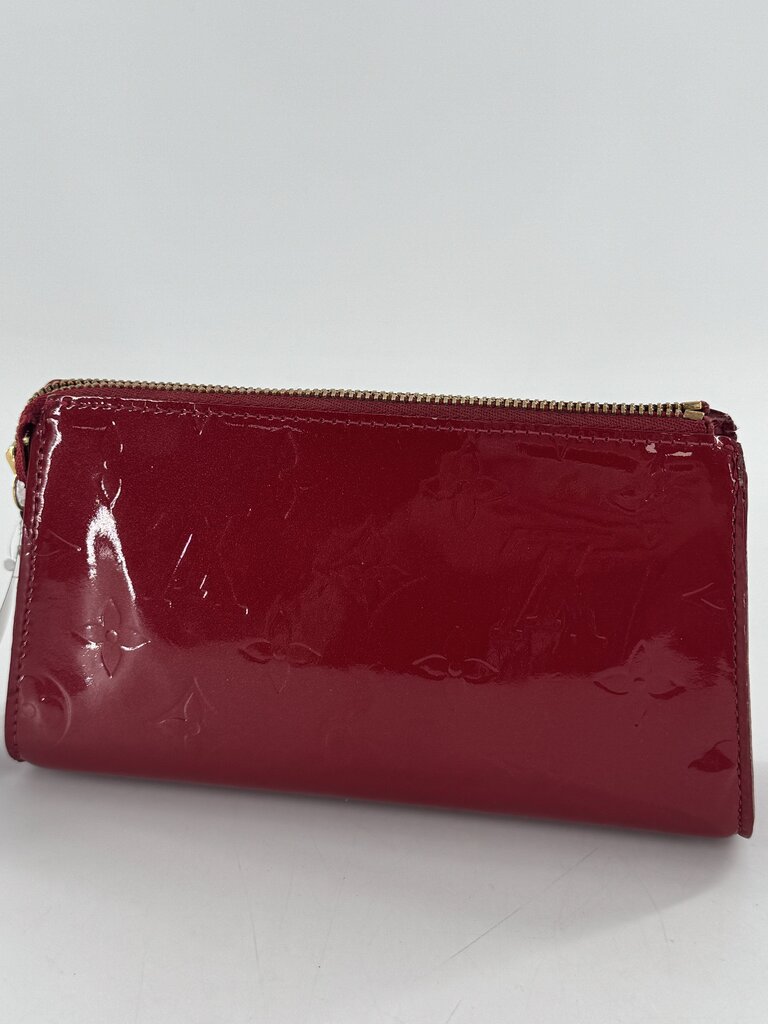 monogram embossed glossy cosmetic case