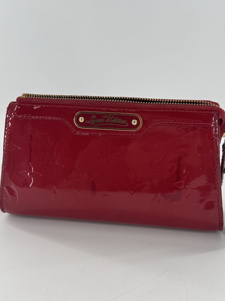 monogram embossed glossy cosmetic case