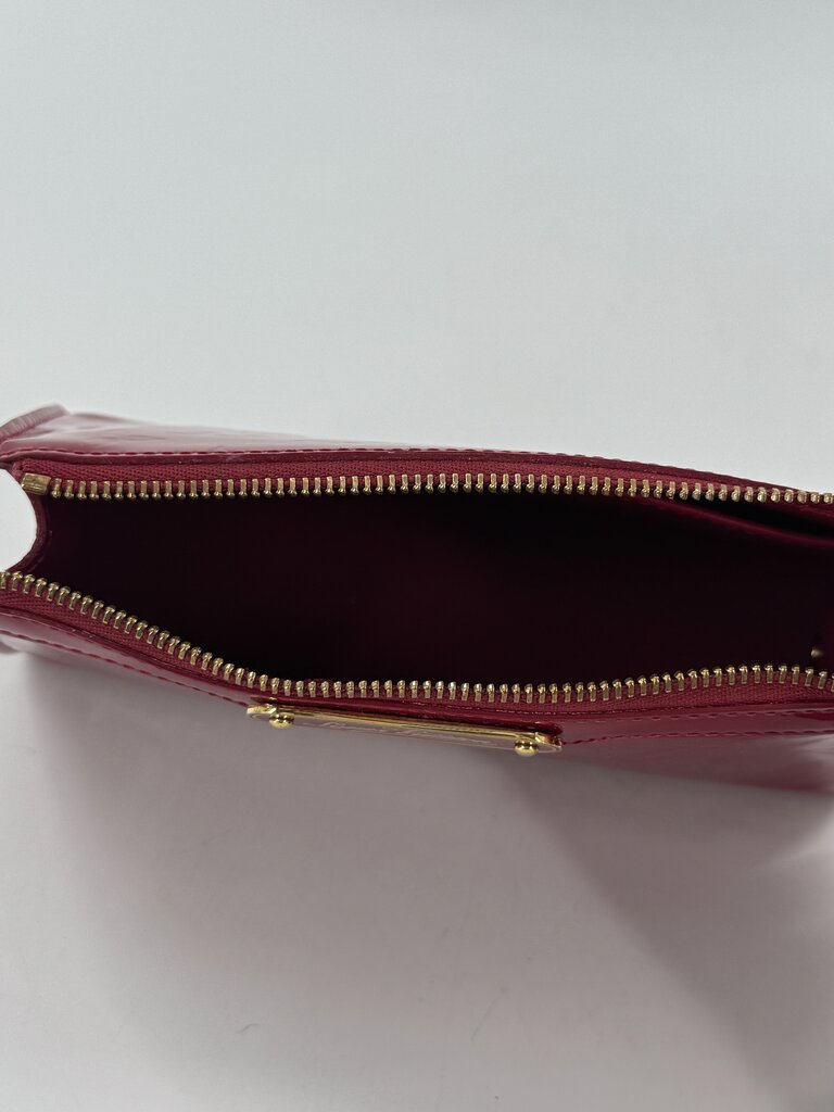 monogram embossed glossy cosmetic case