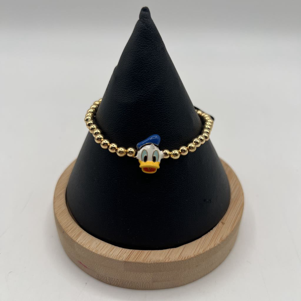 gold beaded donald duck stretch bracelet