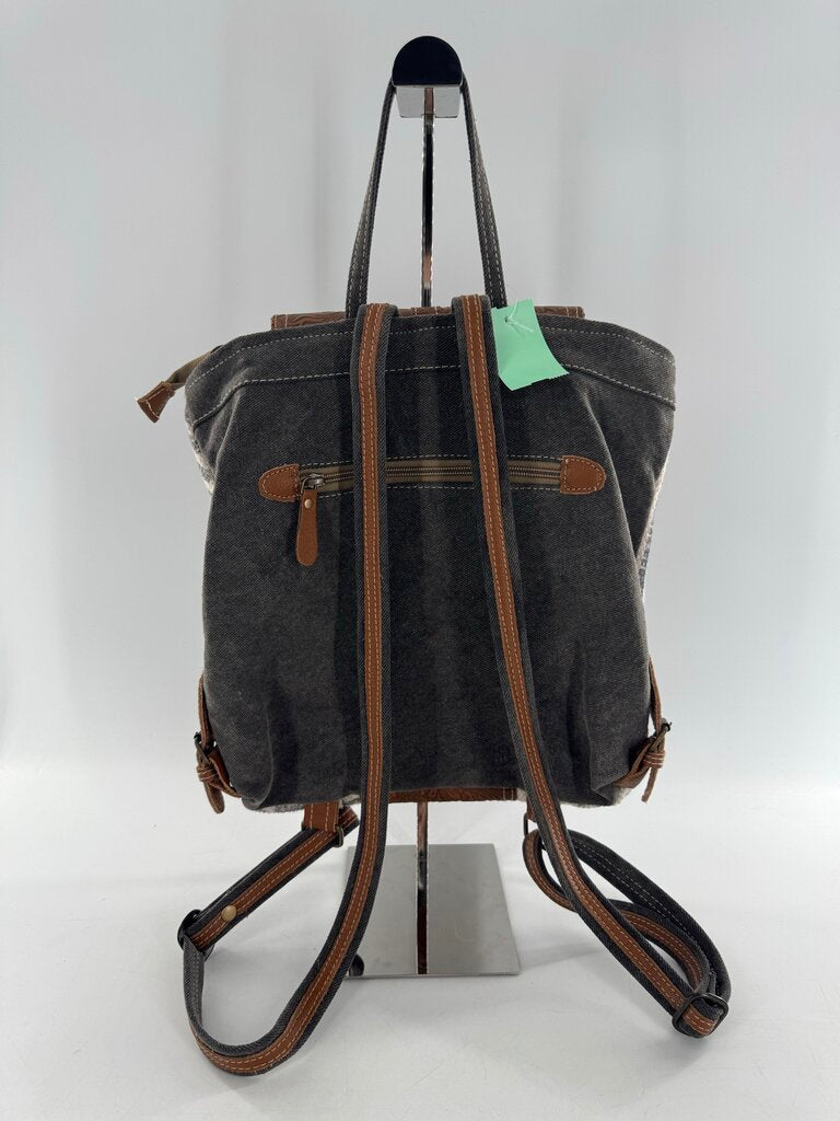 western-inspired tooled backpack