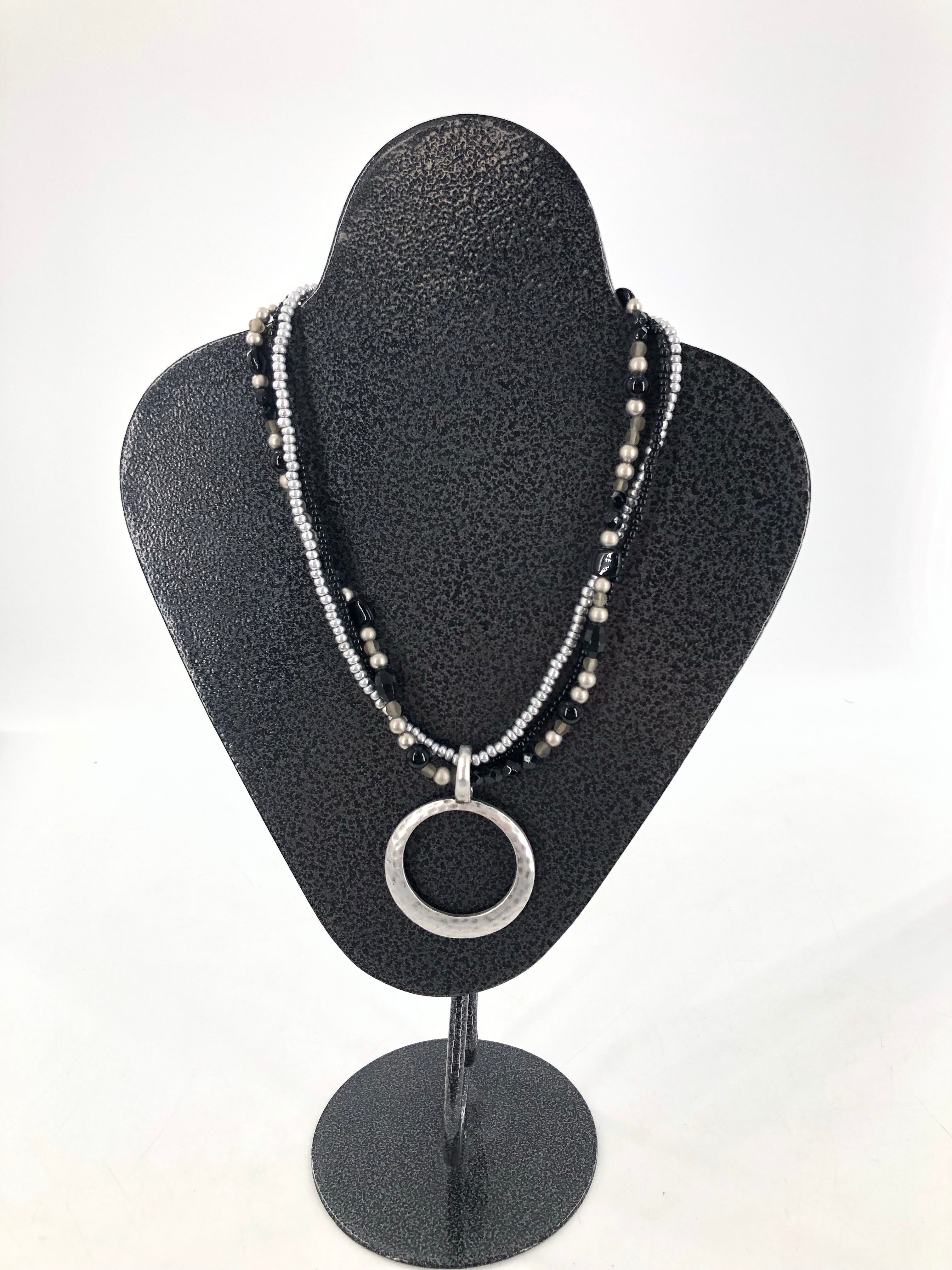 11" black and silver beaded necklace w/ circle pendant