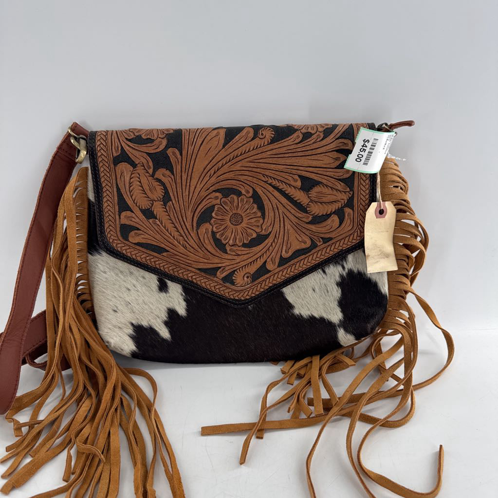 R90 tooled cowhide fringe crossbody