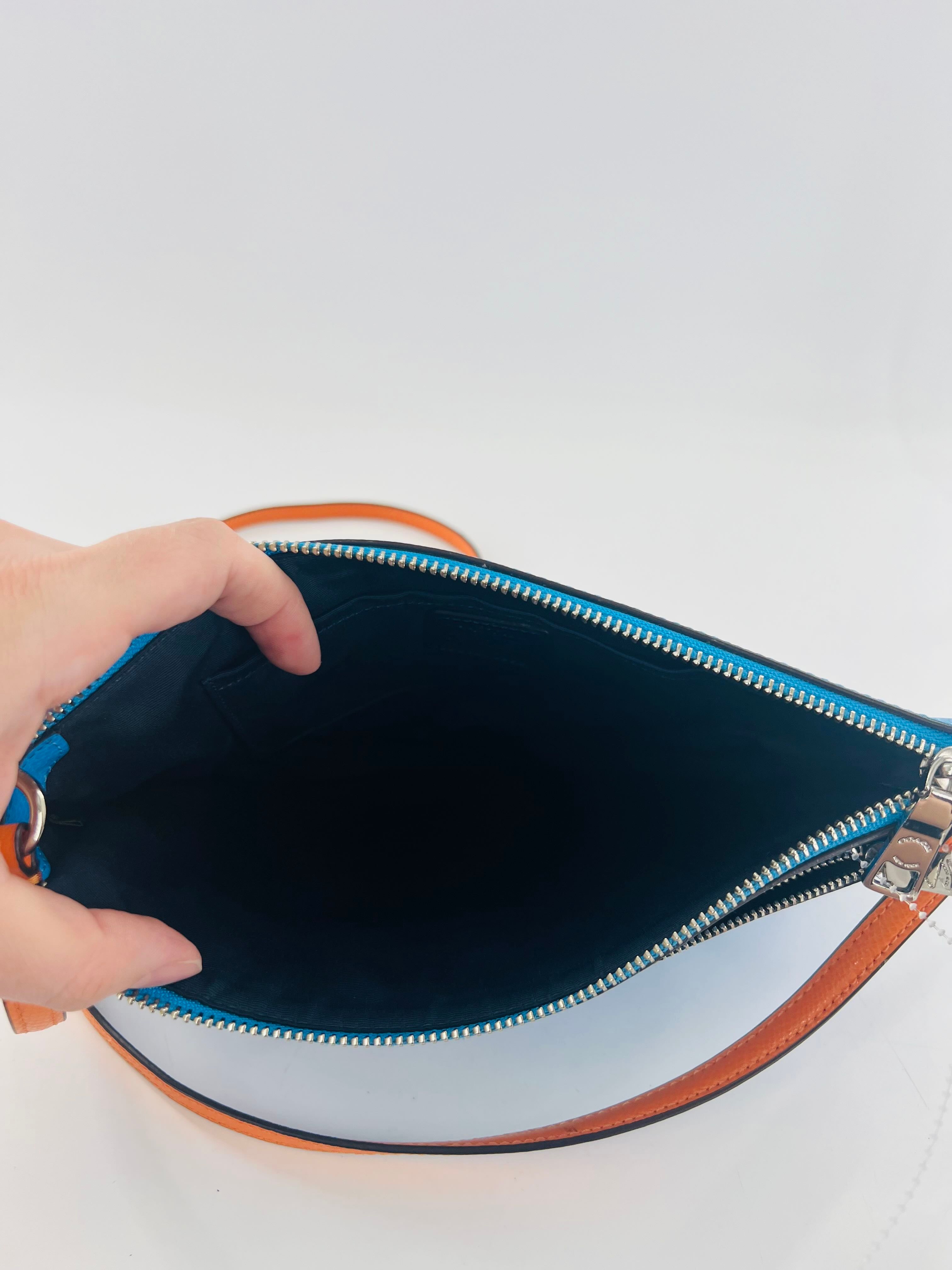 east/west crossbody w/ pop out pouch