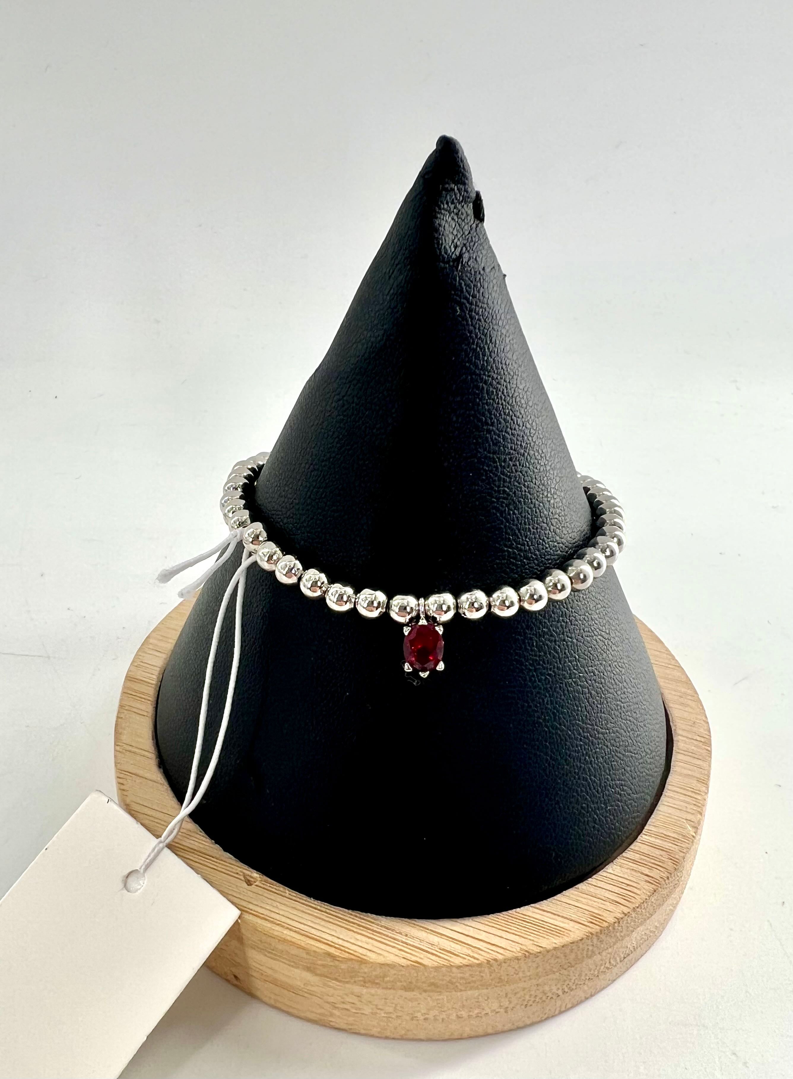 silver beaded stretch bracelet/red stone