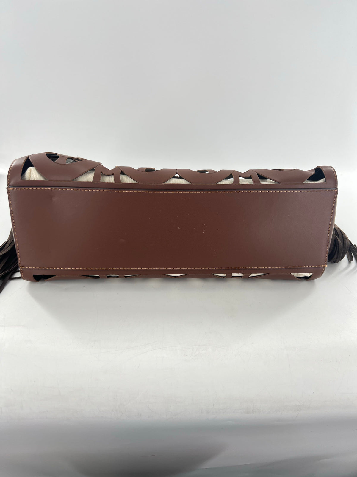 R415 leather hand-tooled musical notes tote