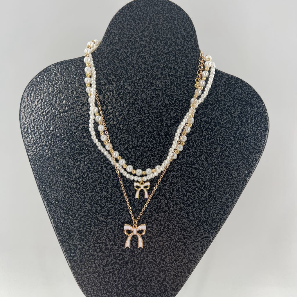 gold & white bows necklace stack