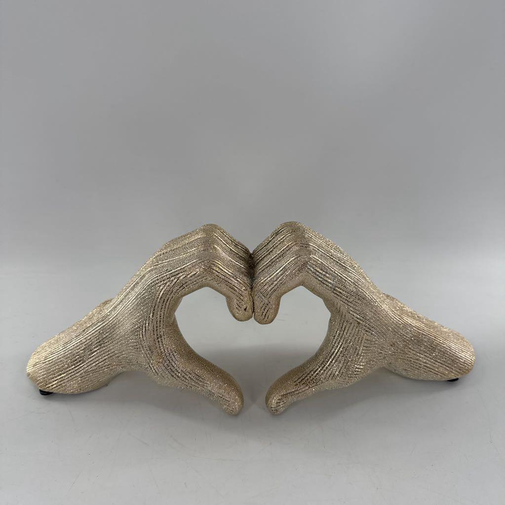 gold heart hands