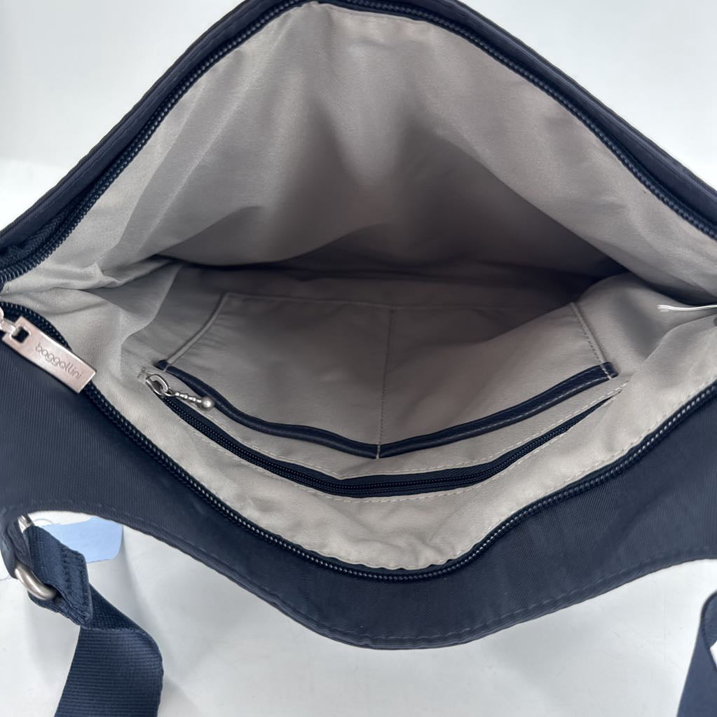 nylon crossbody w/ slip/zip pockets