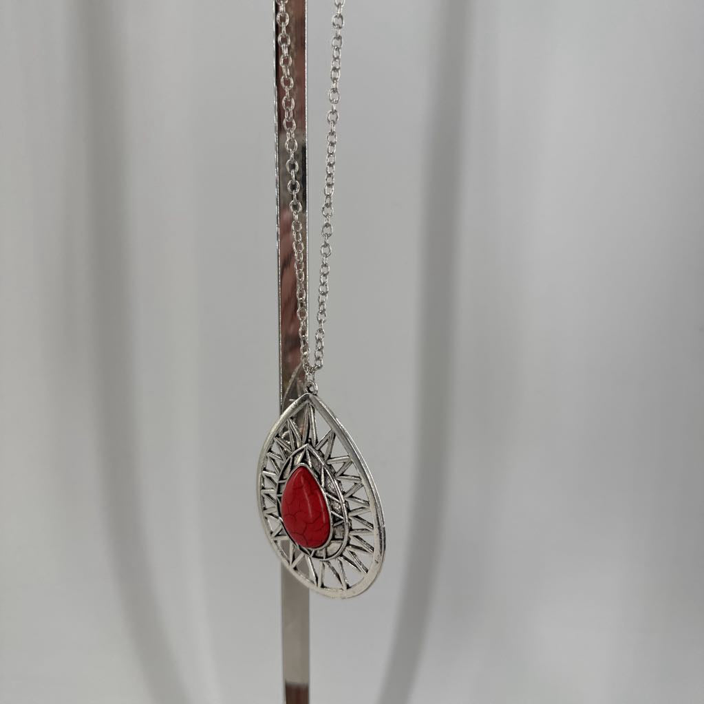 20" silver tone teardrop pendant w/ orange stone necklace