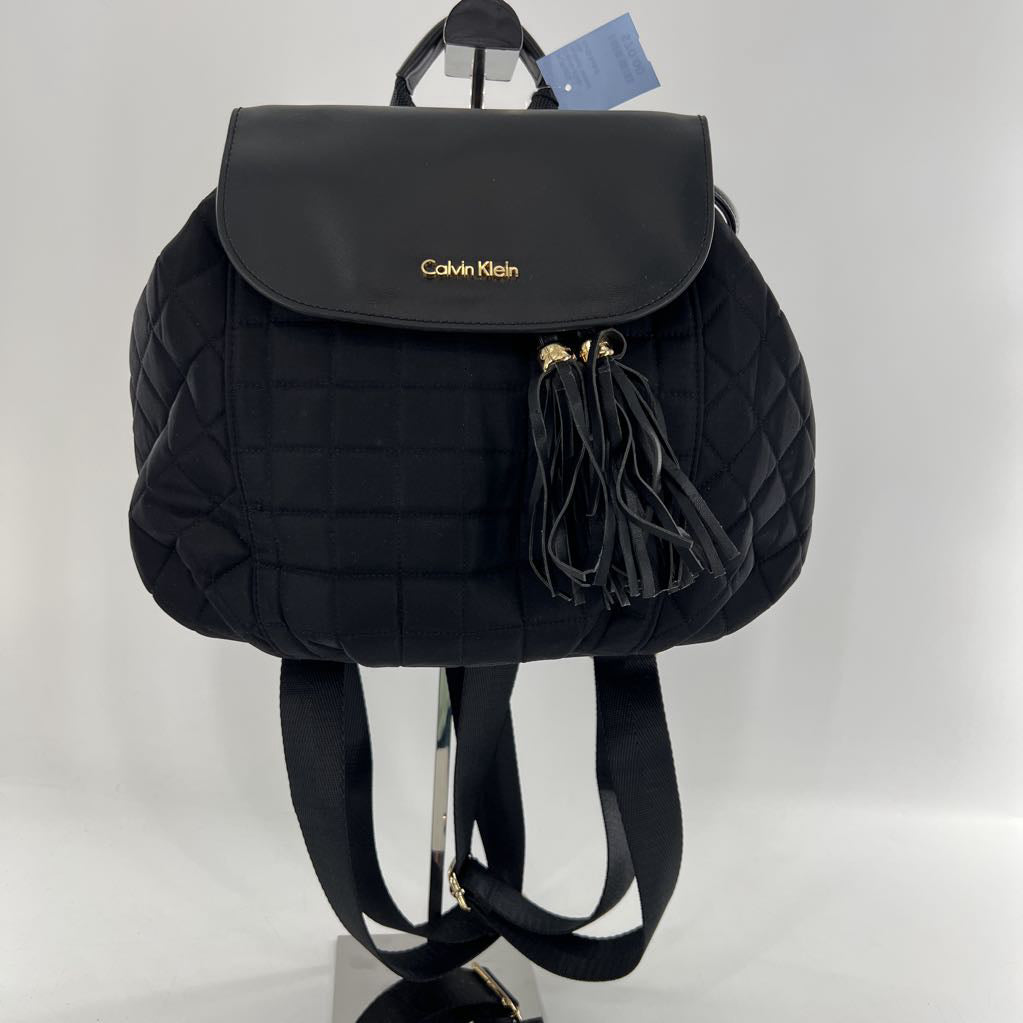 quilted tassel backpack