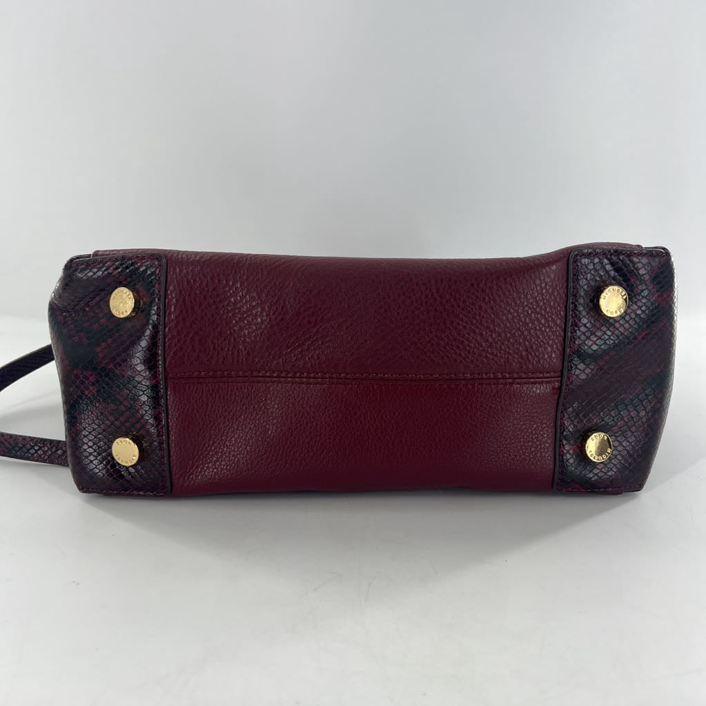 snakeskin embossed side panels and handles satchel