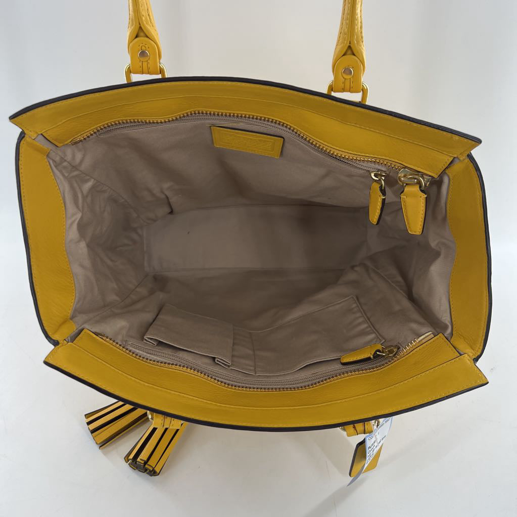 top zip tassel tote