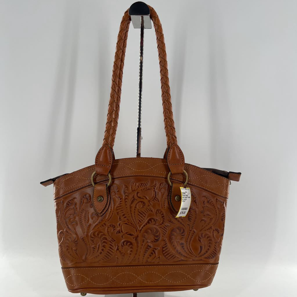 hand tooled footed shoulder bag