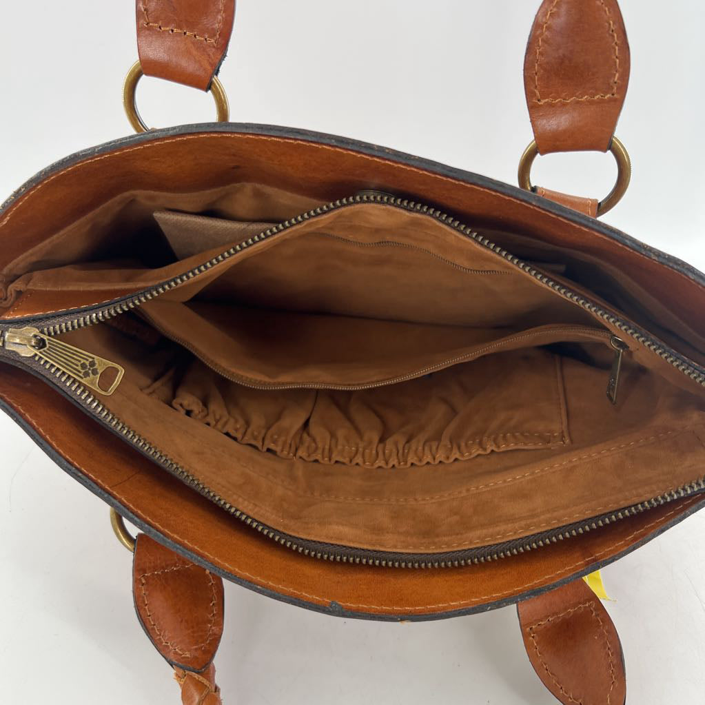 hand tooled footed shoulder bag