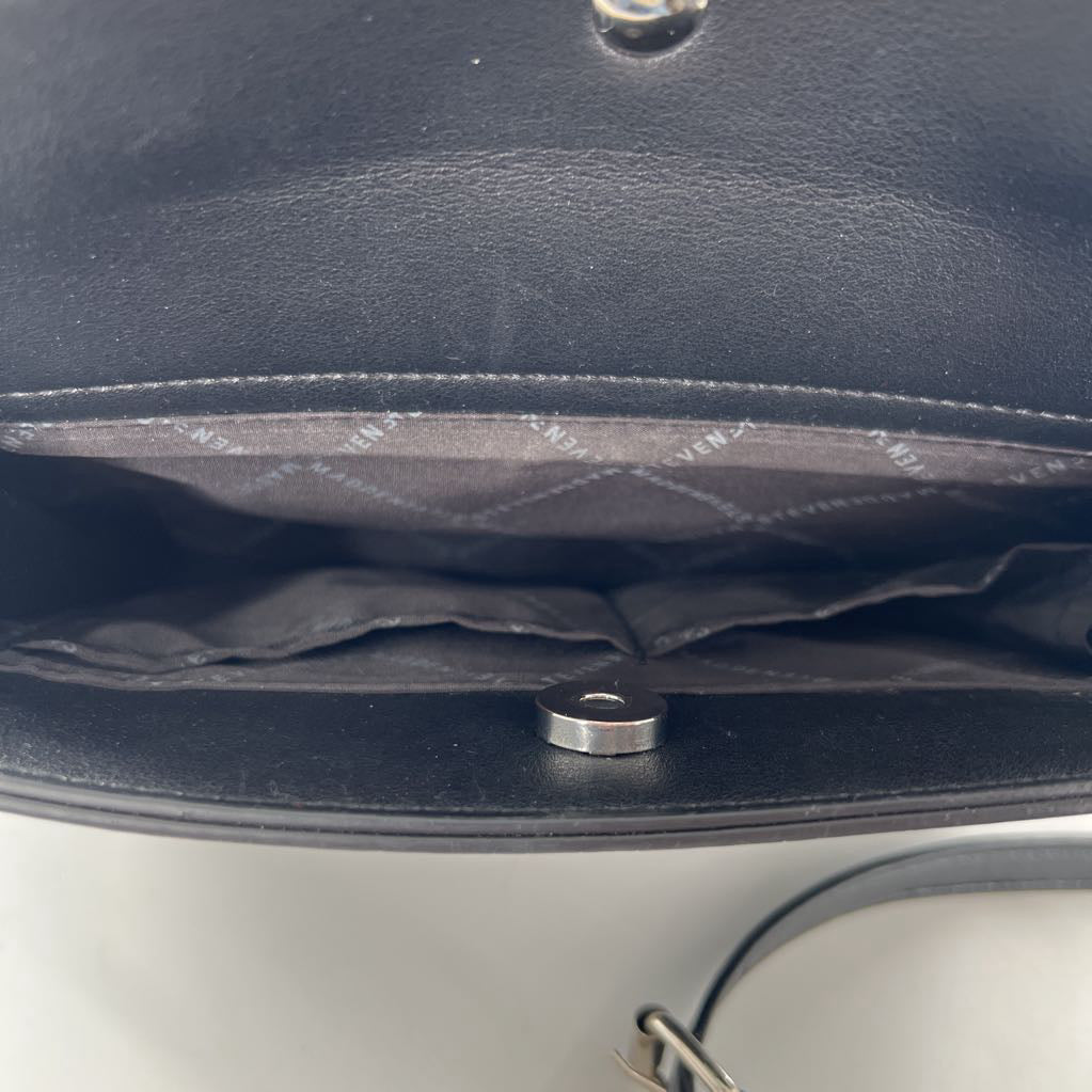 structured embossed lettering crossbody