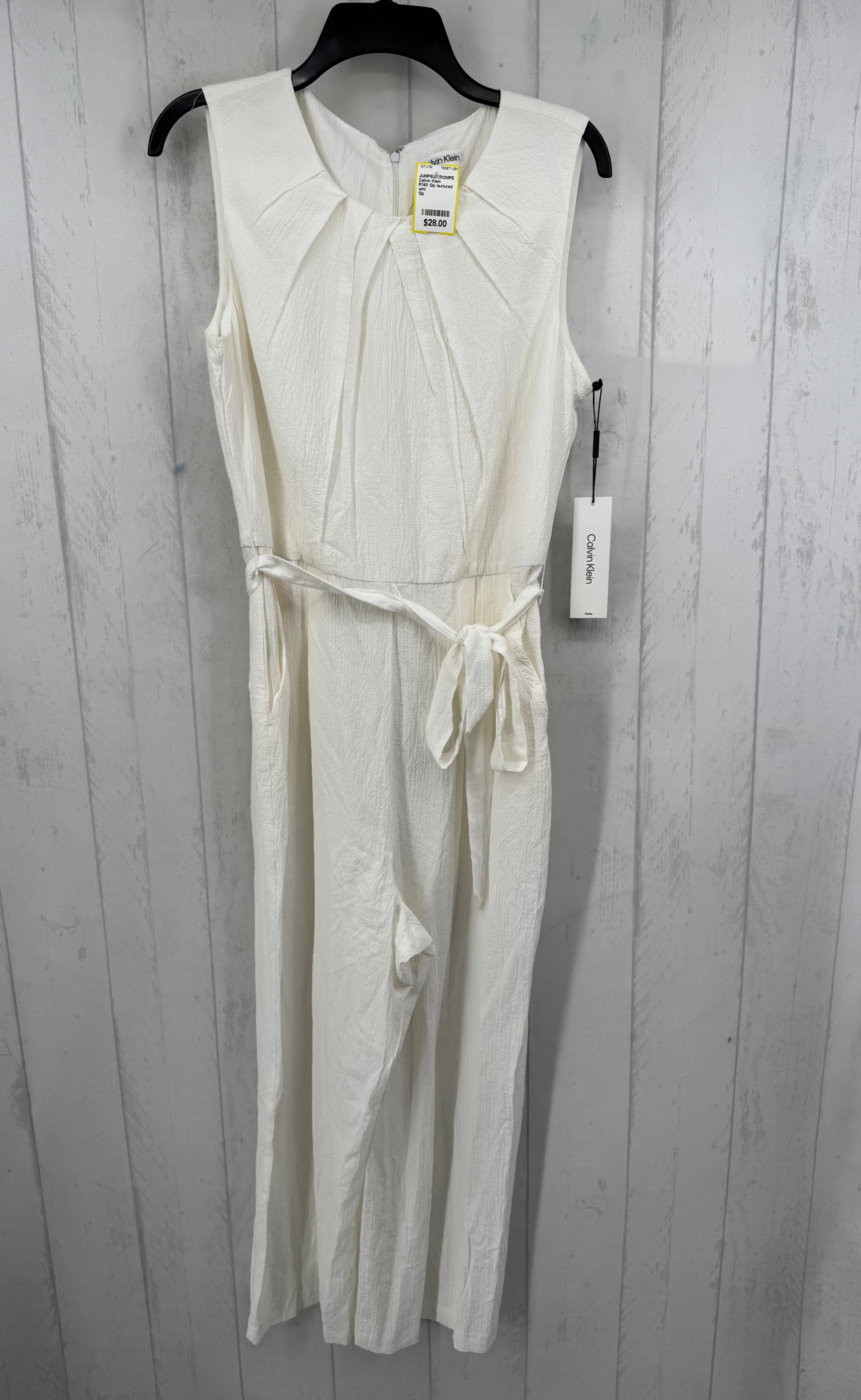 R140 12p textured slvls belted jumpsuit