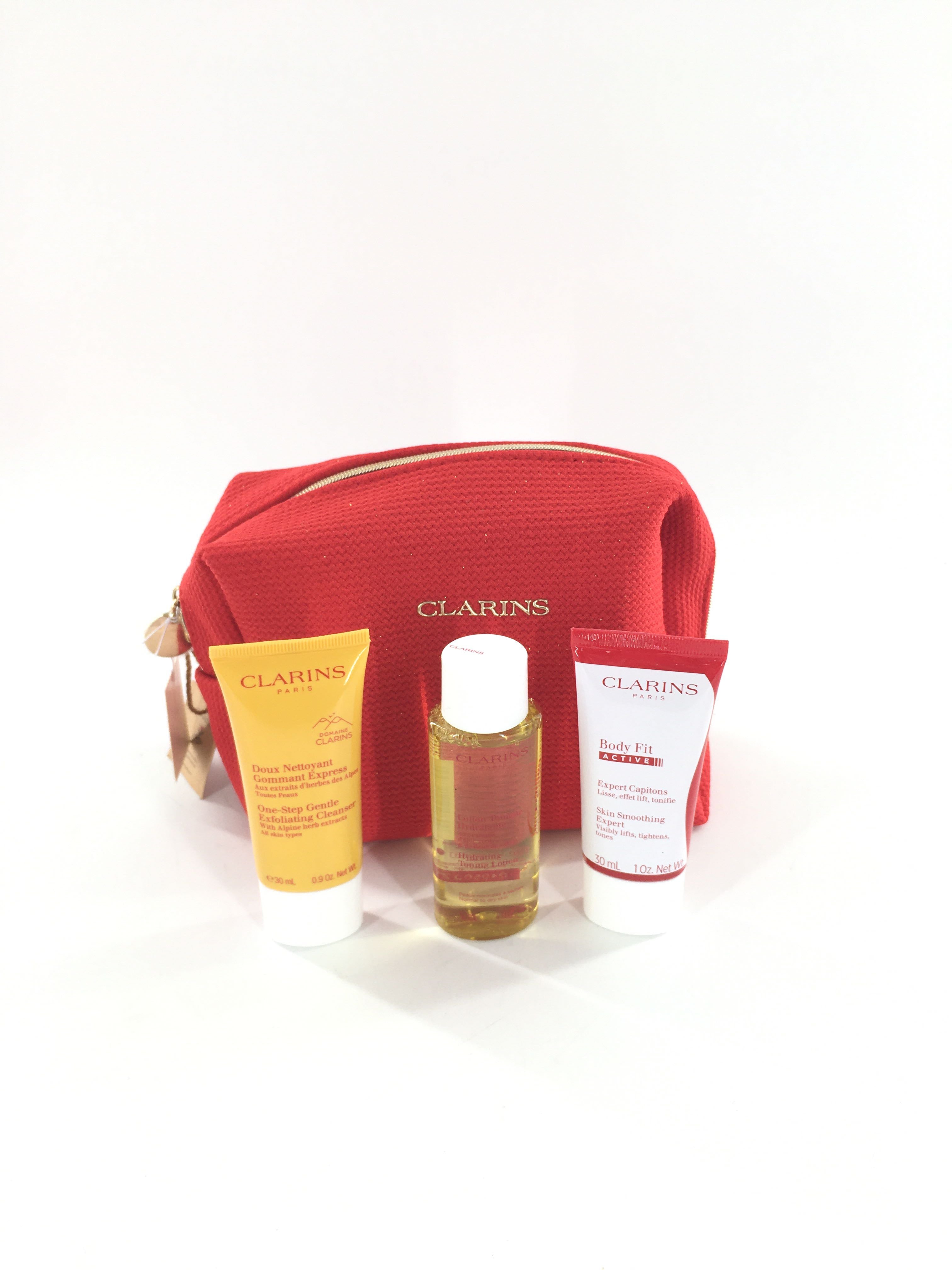 clarins giftset (red cosmetic bag,body fit,cleanser,toner)