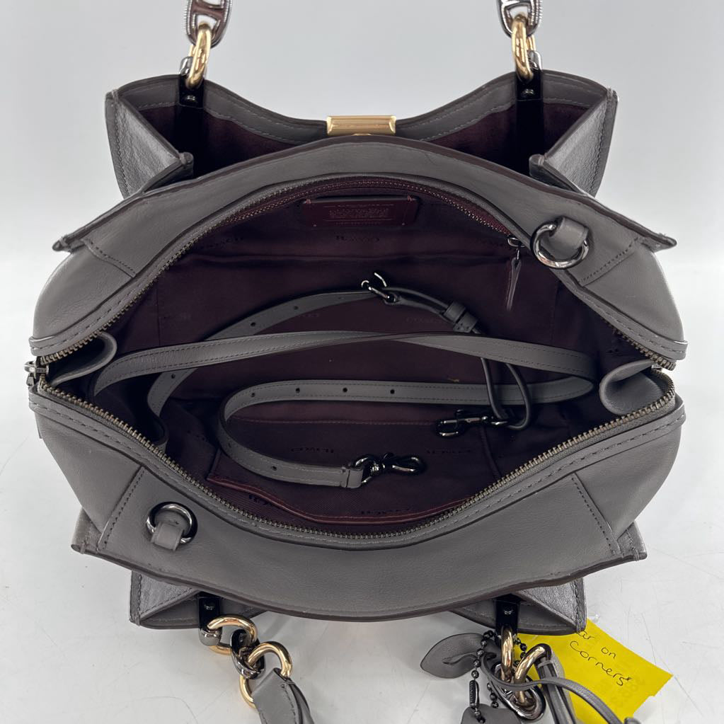 top zip satchel w/ two snap closure slip pockets