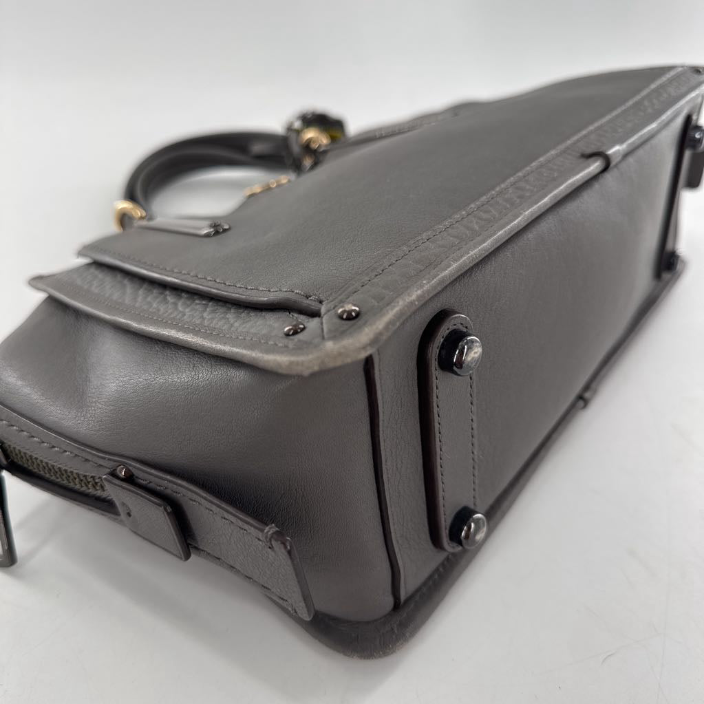 top zip satchel w/ two snap closure slip pockets