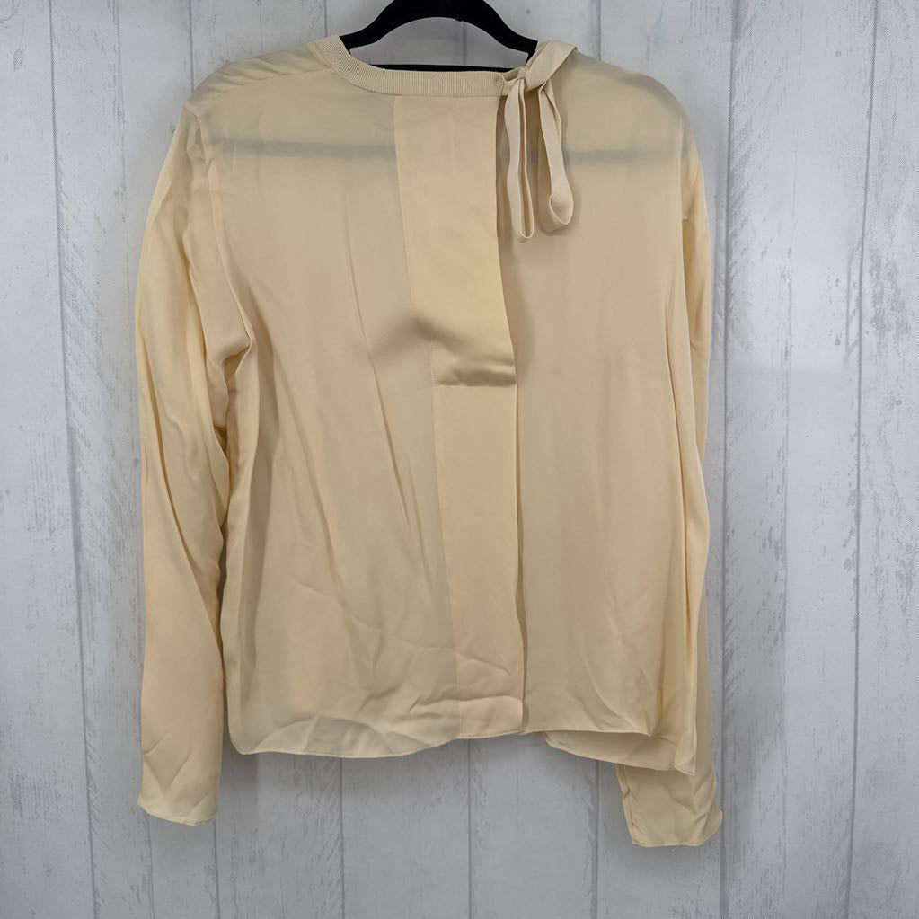 M bow back l/s top