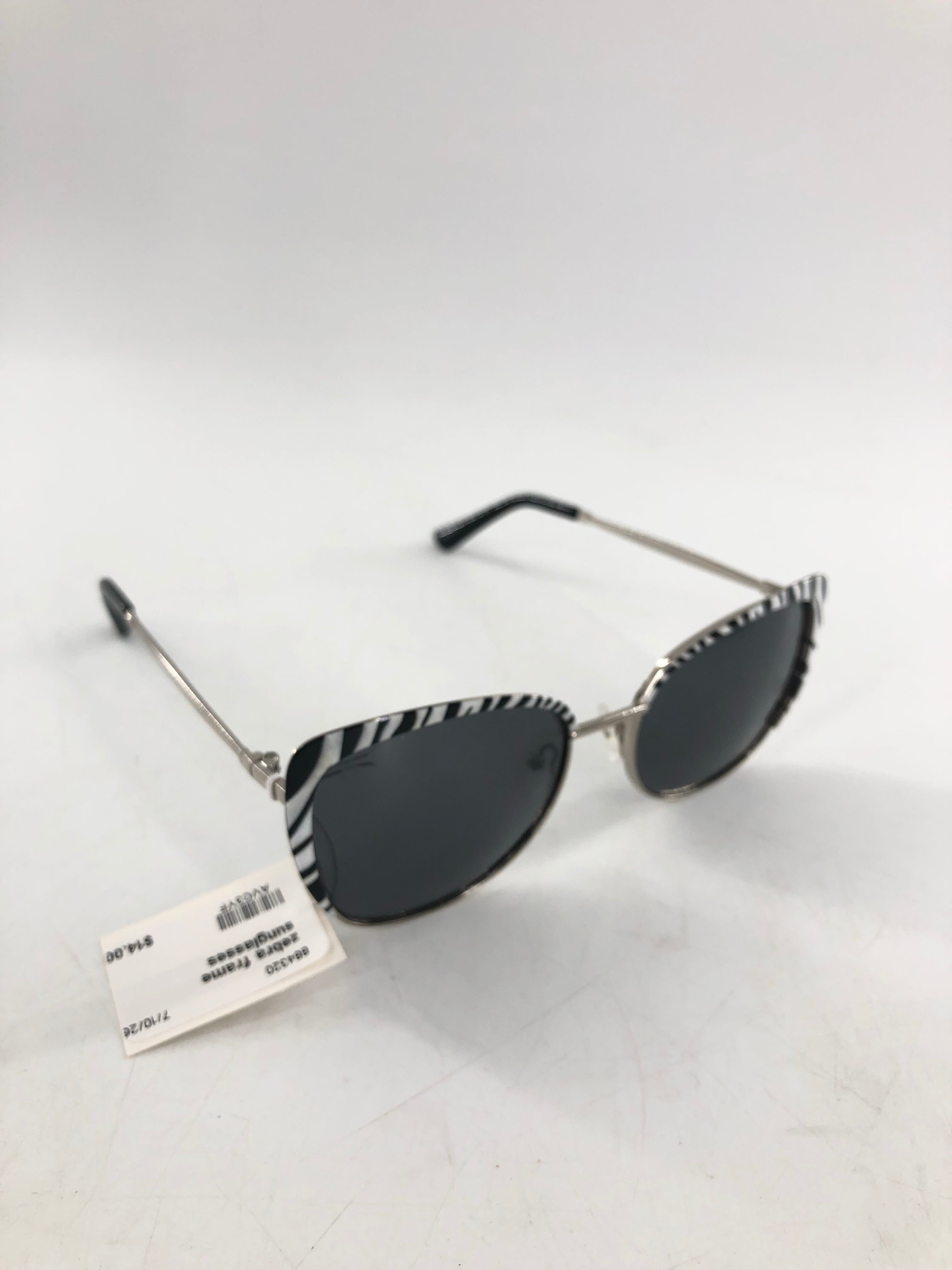 zebra frame sunglasses