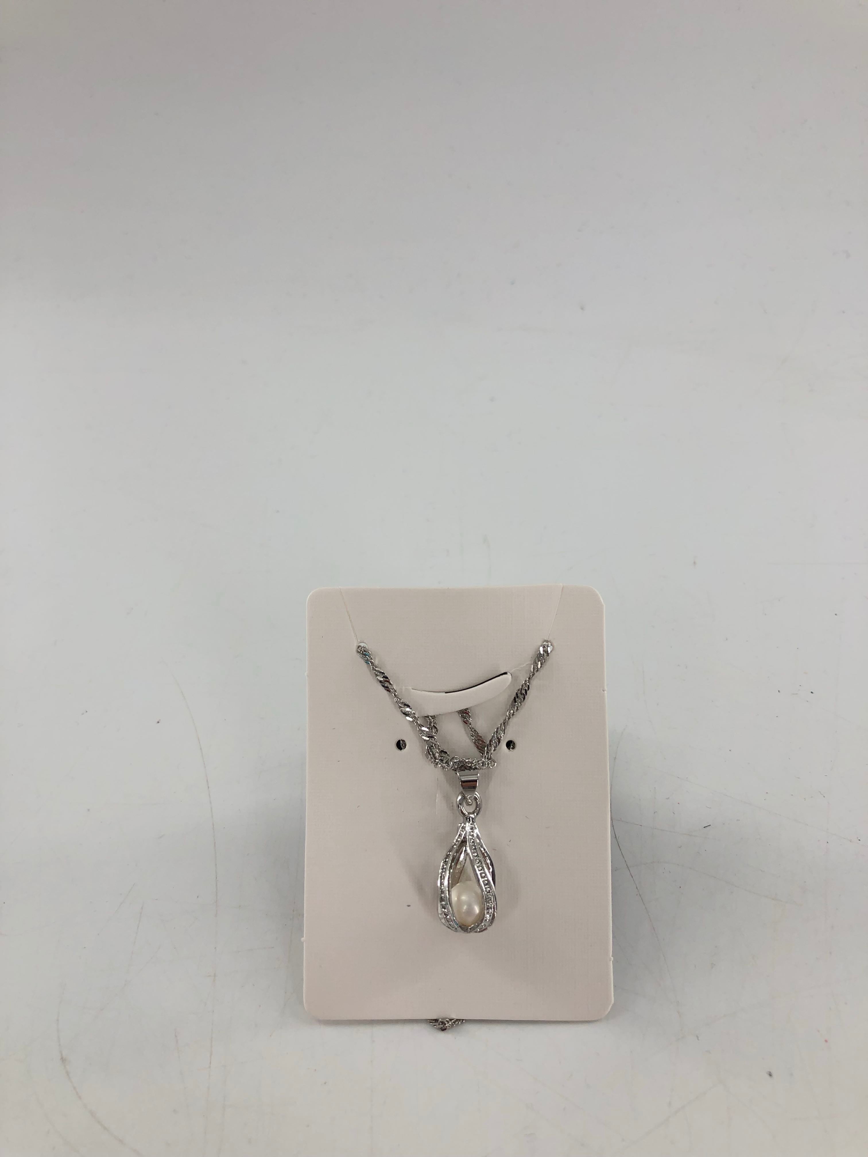 silver necklace w/ pearl pendant