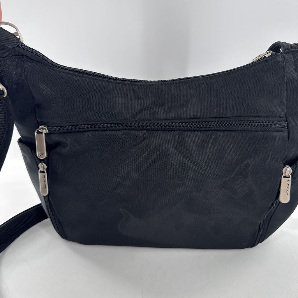 top zip crossbody w/ front outside zip around pocket