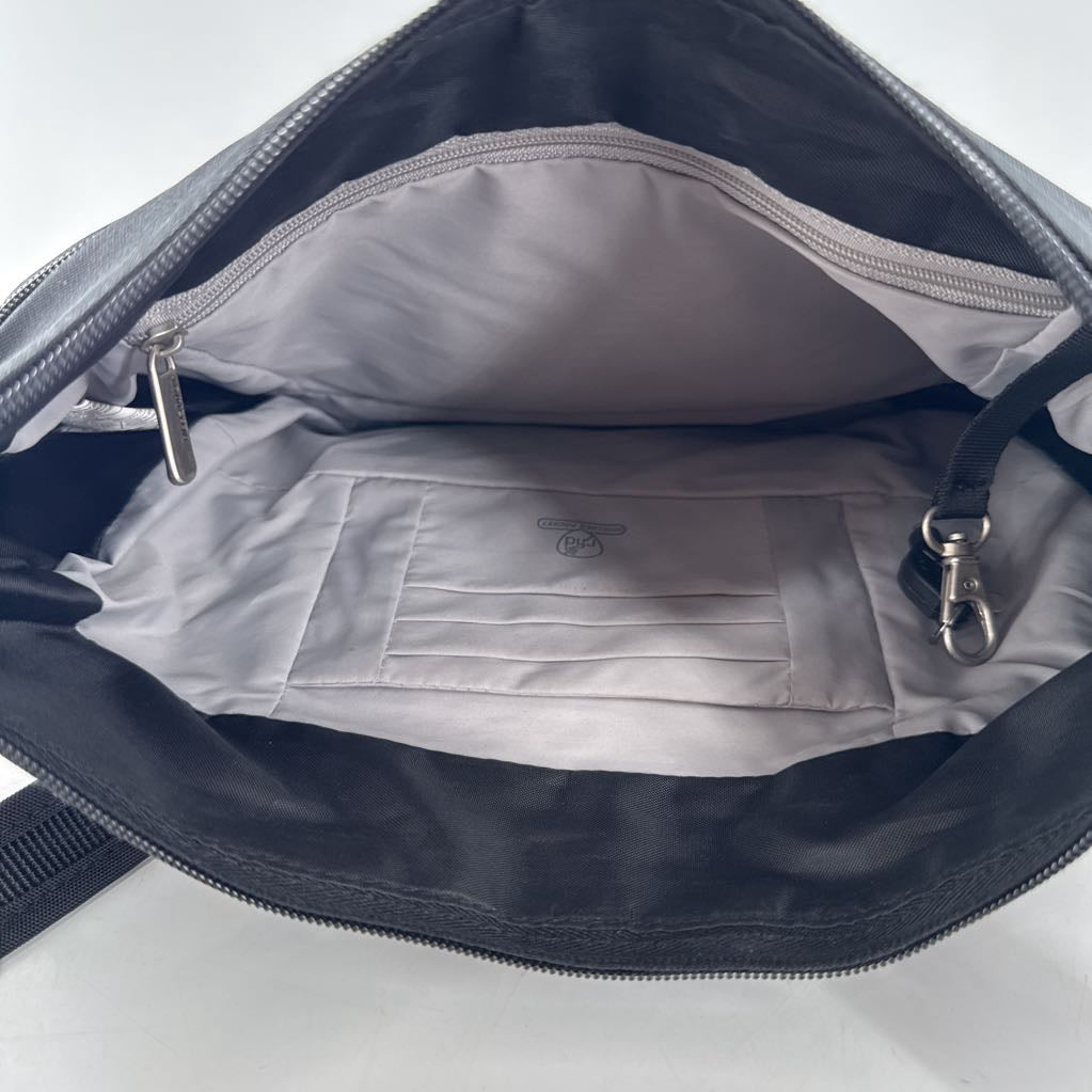 top zip crossbody w/ front outside zip around pocket