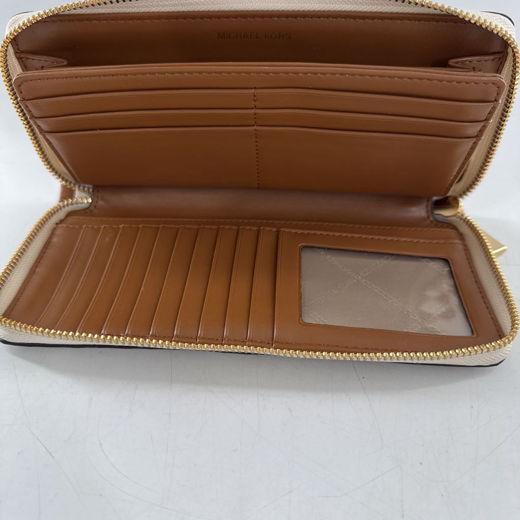 zip around monogram wallet
