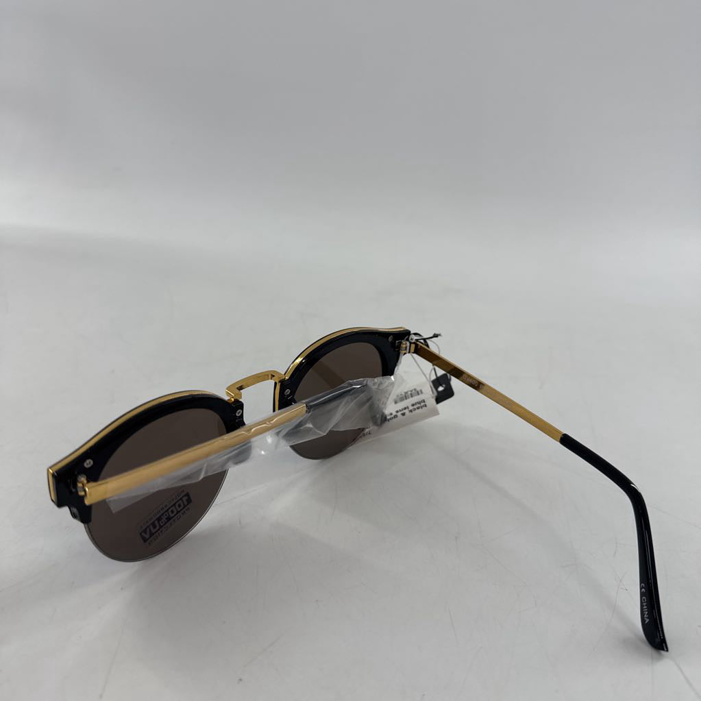 black & gold frame blue lens sunglasses