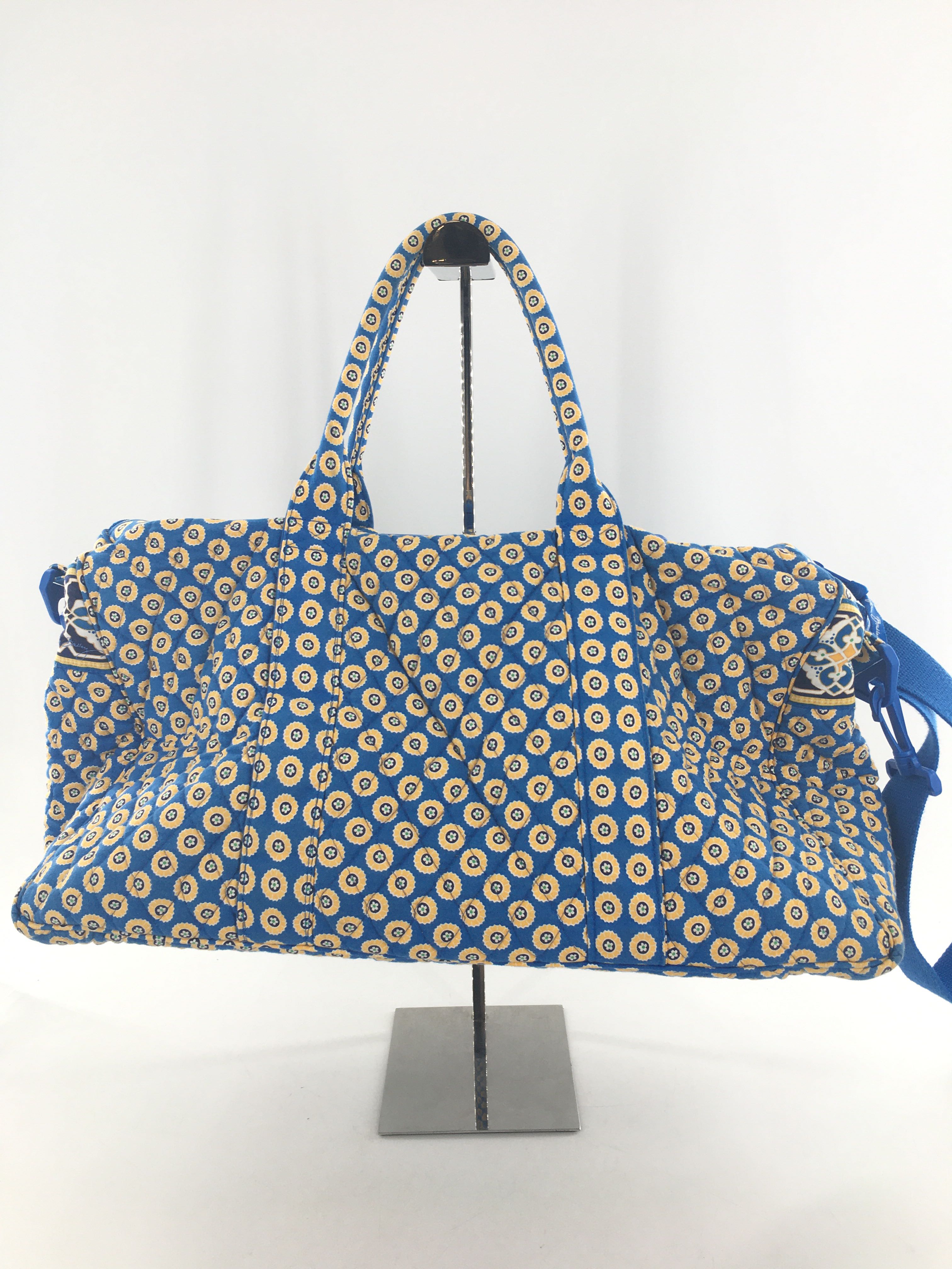 quilted circular floral design overnight bag