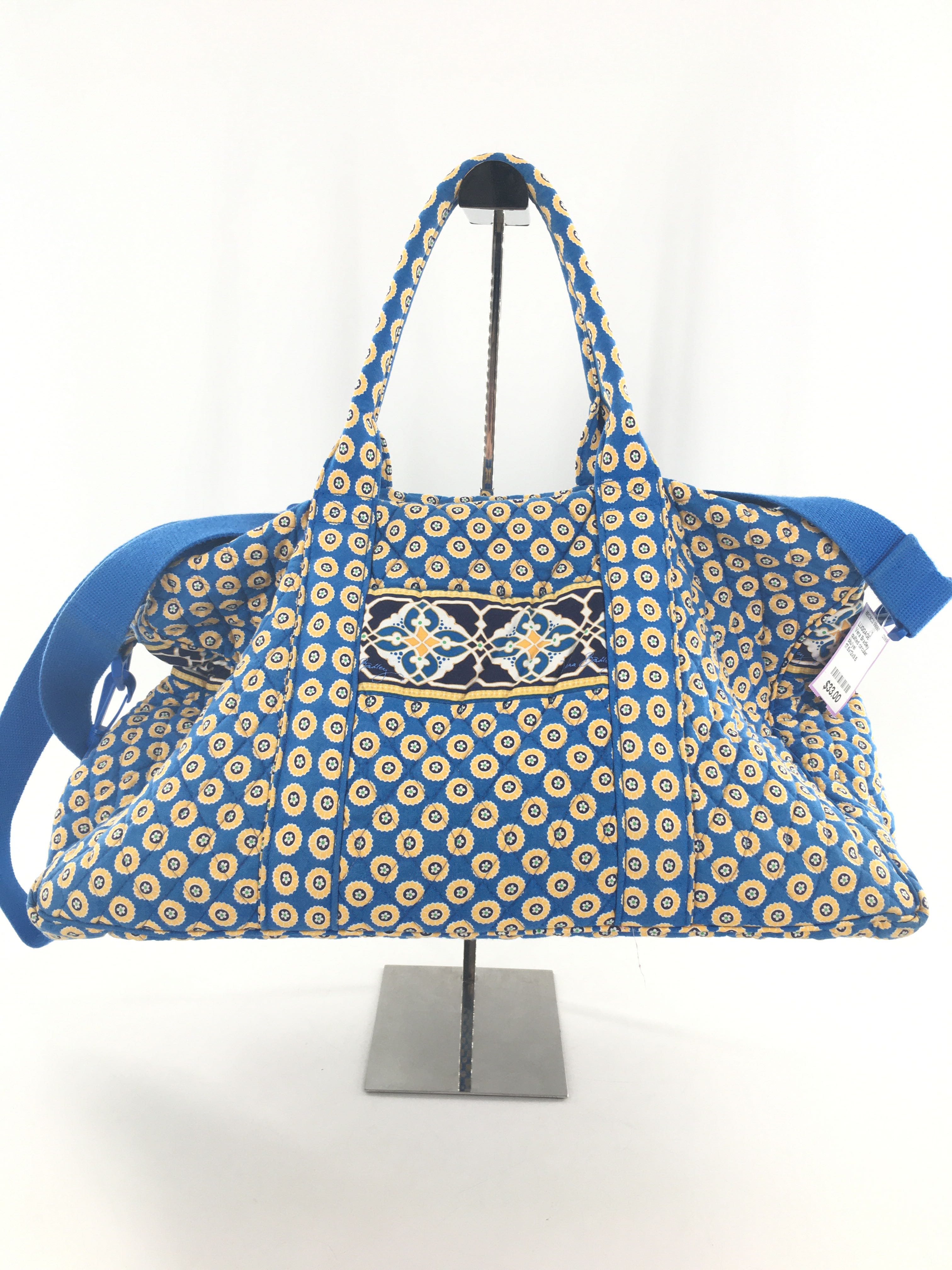 quilted circular floral design overnight bag