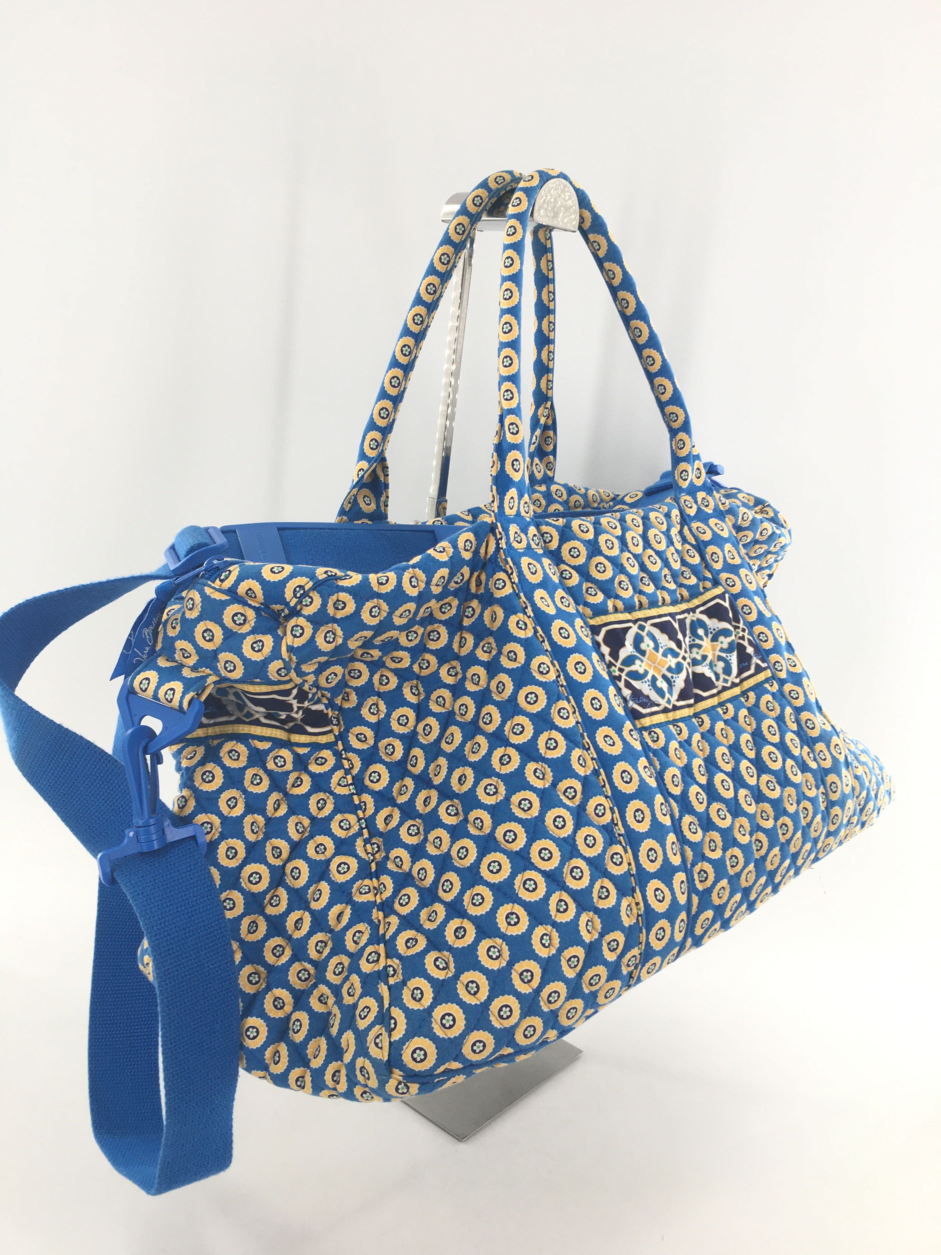 quilted circular floral design overnight bag
