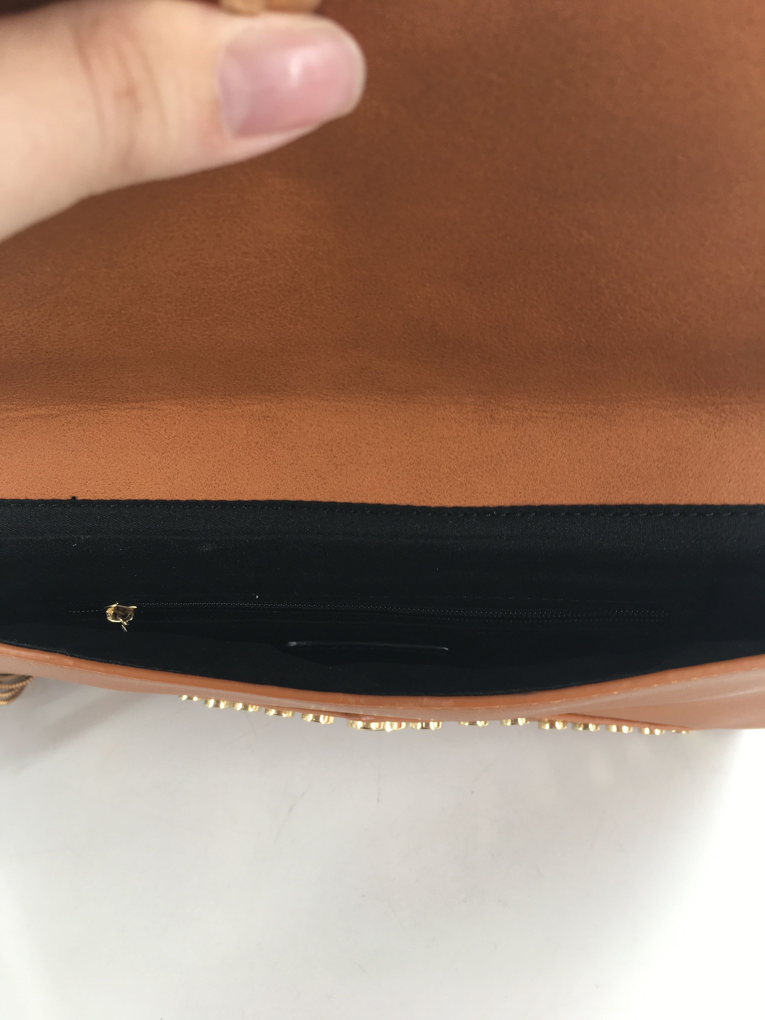 tassel studded envelope flap clutch