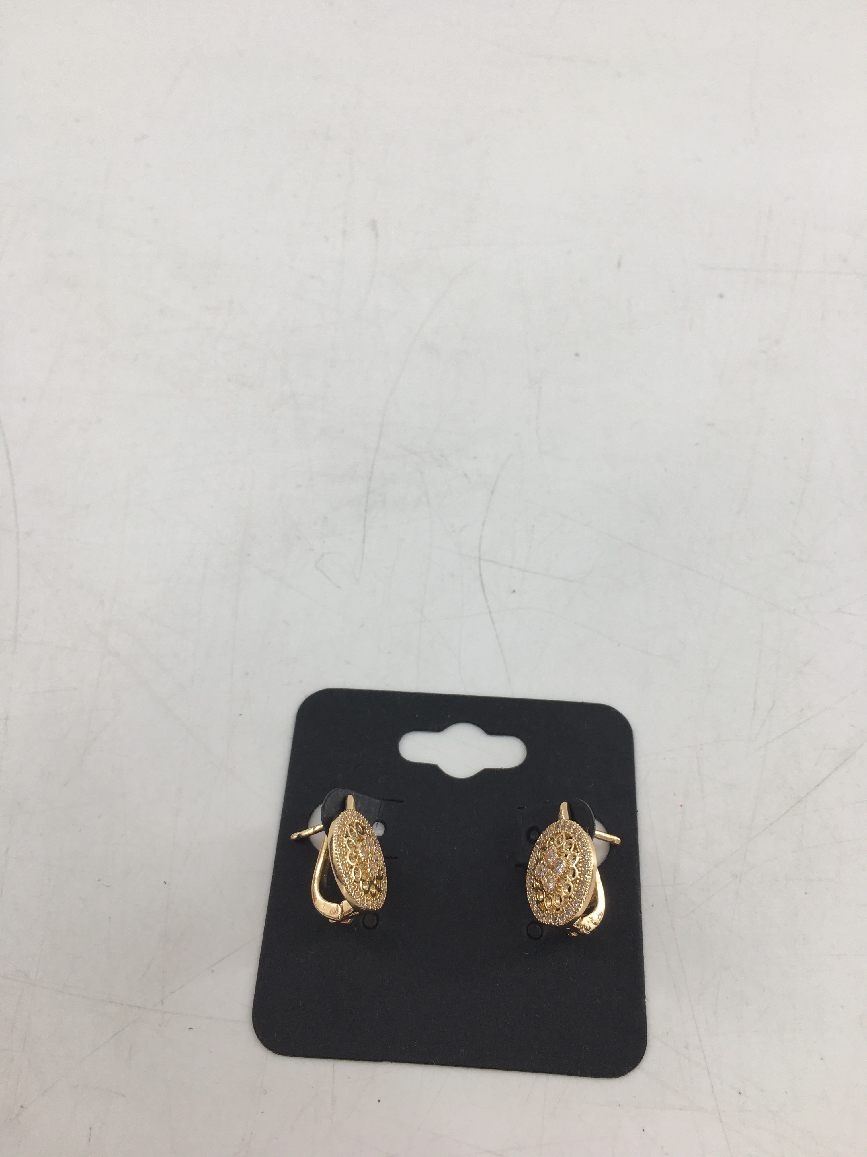 goldtone medallion earrings