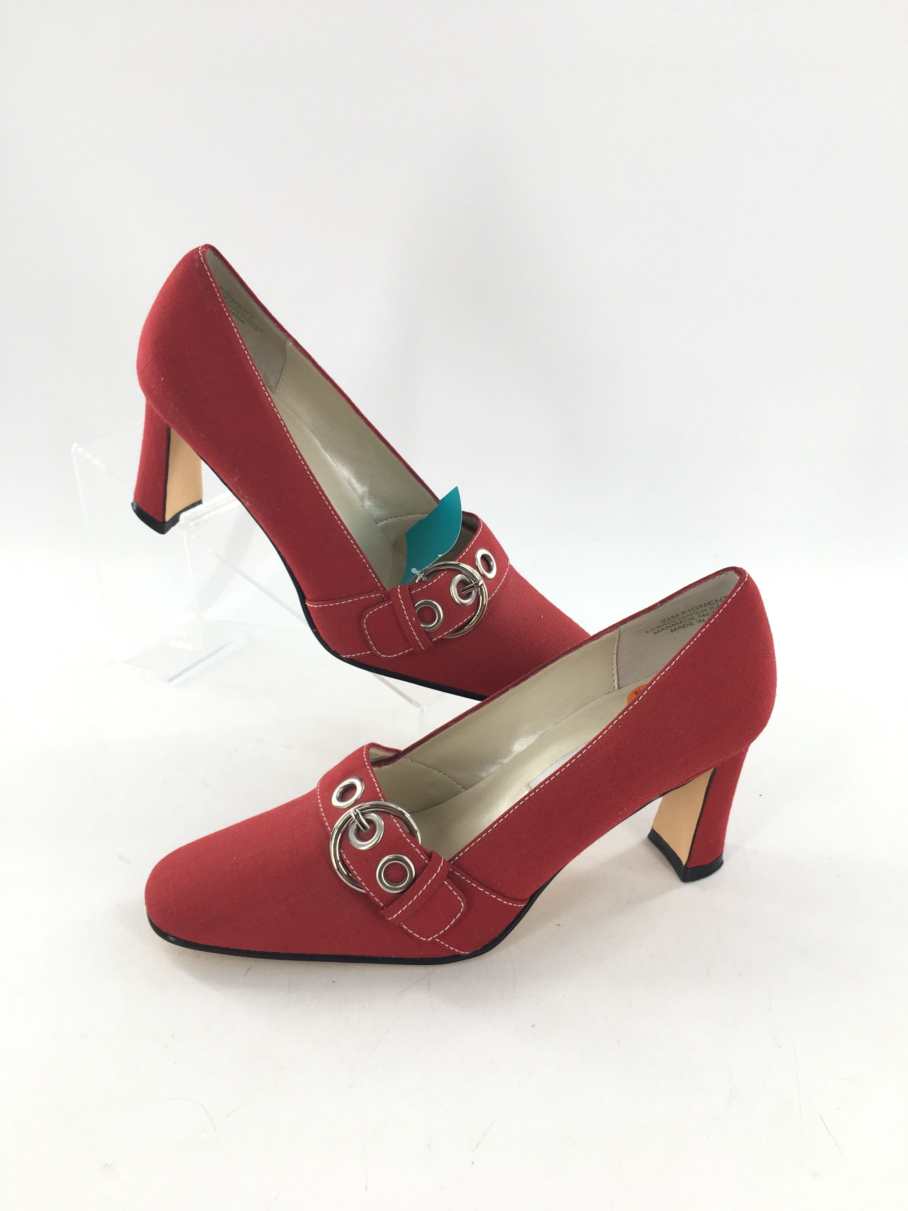 8.5 silver buckle pumps