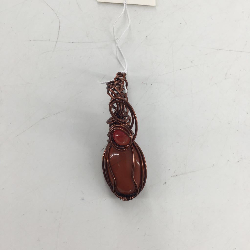 wire wrapped orange oval stone pendant