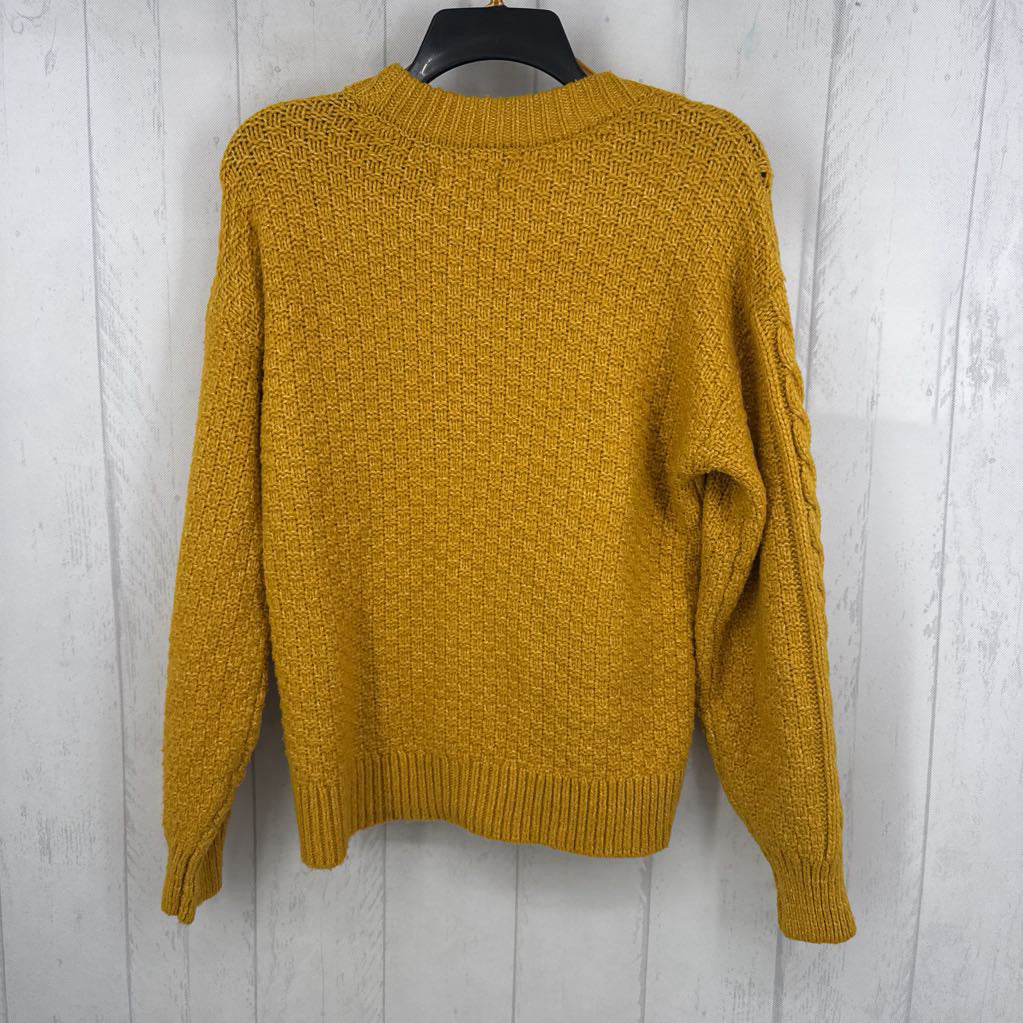 M cable knit sweater