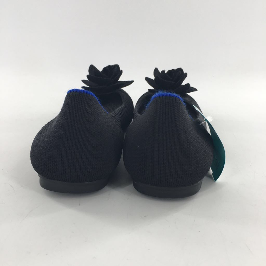 9 sculptural knit flower slip-on flat