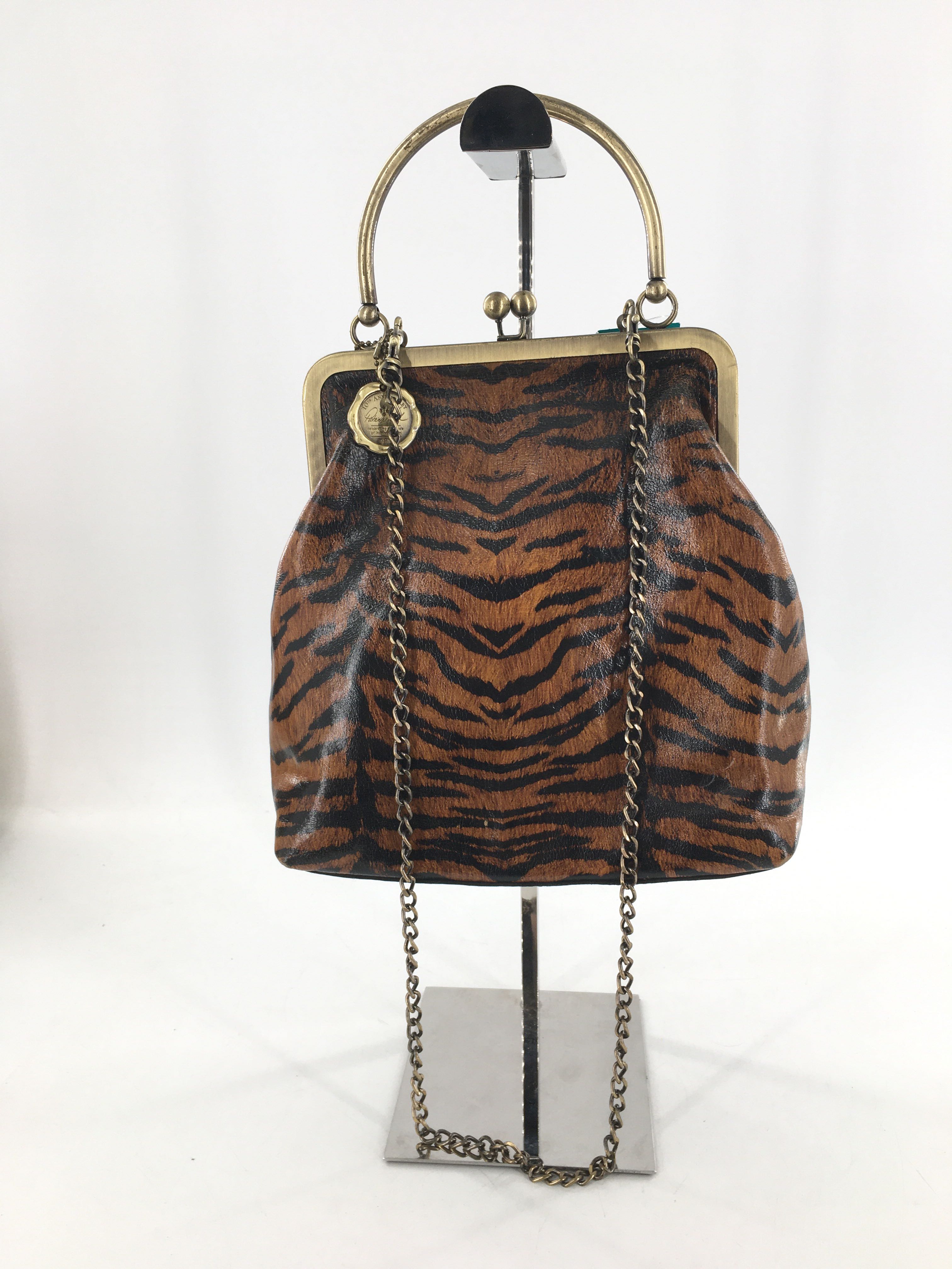 frame tiger print circulat handle satchel