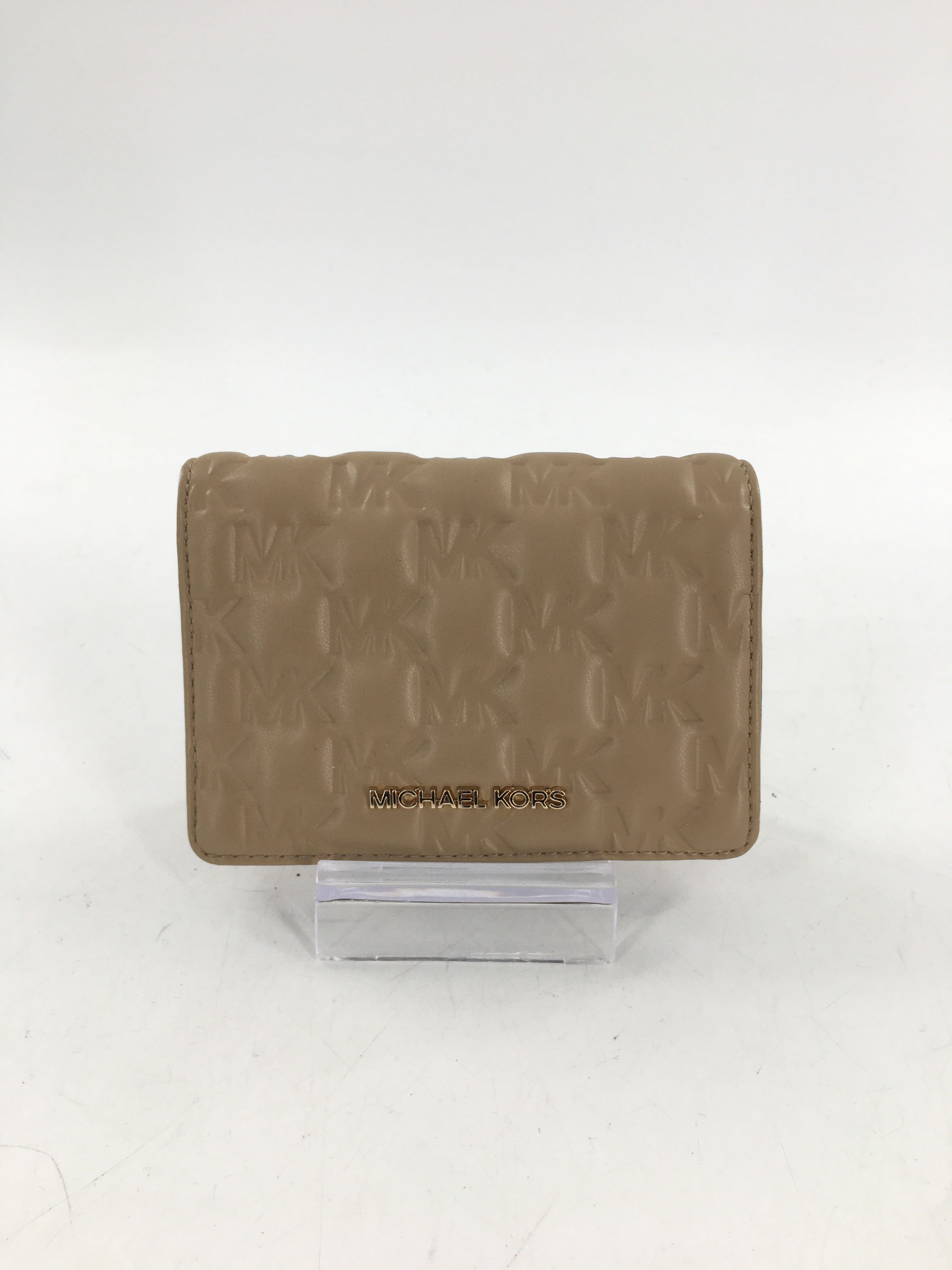 debossed puffy monogram bifold wallet