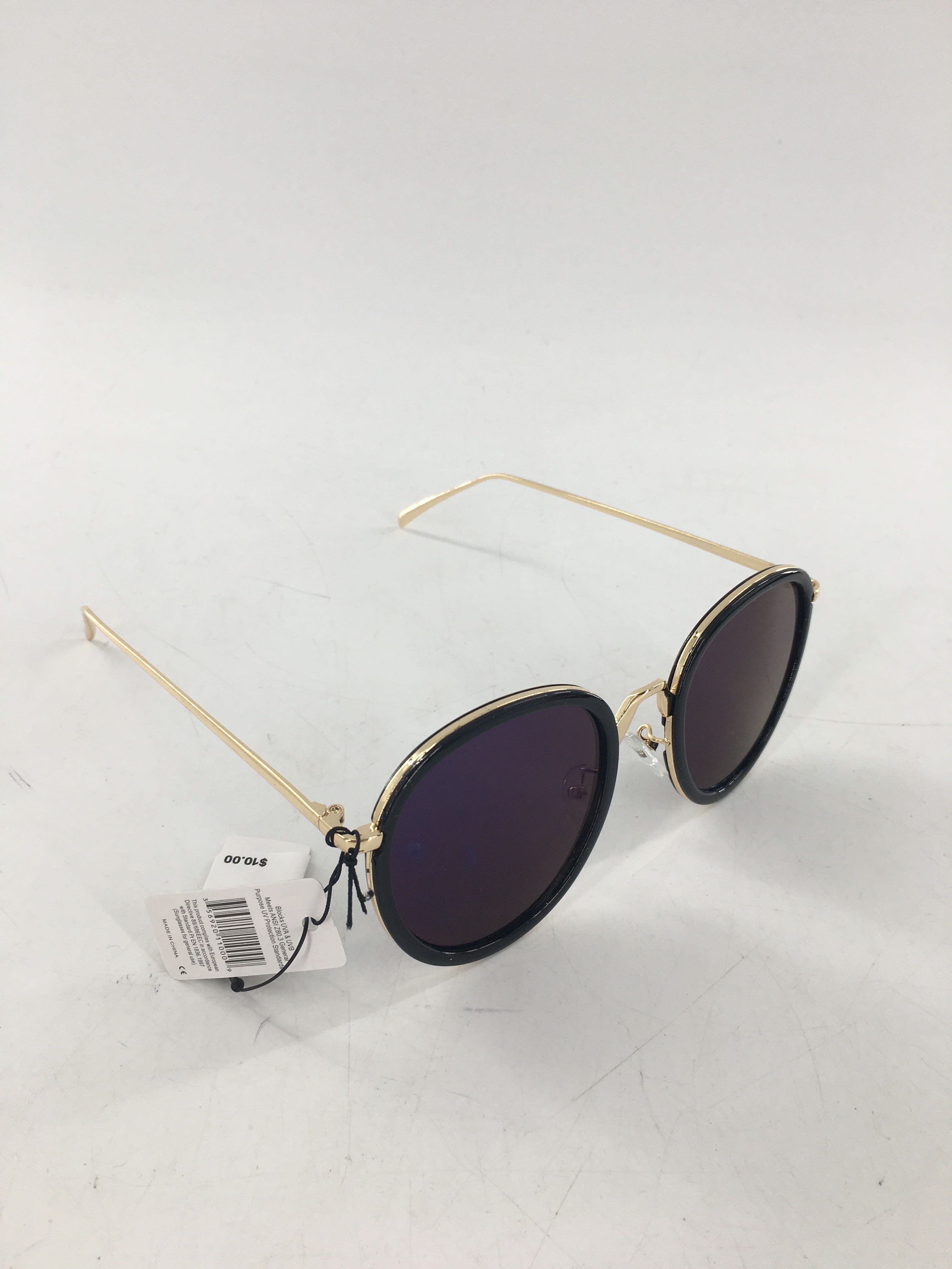 black & gold frame blue lens sunglasses