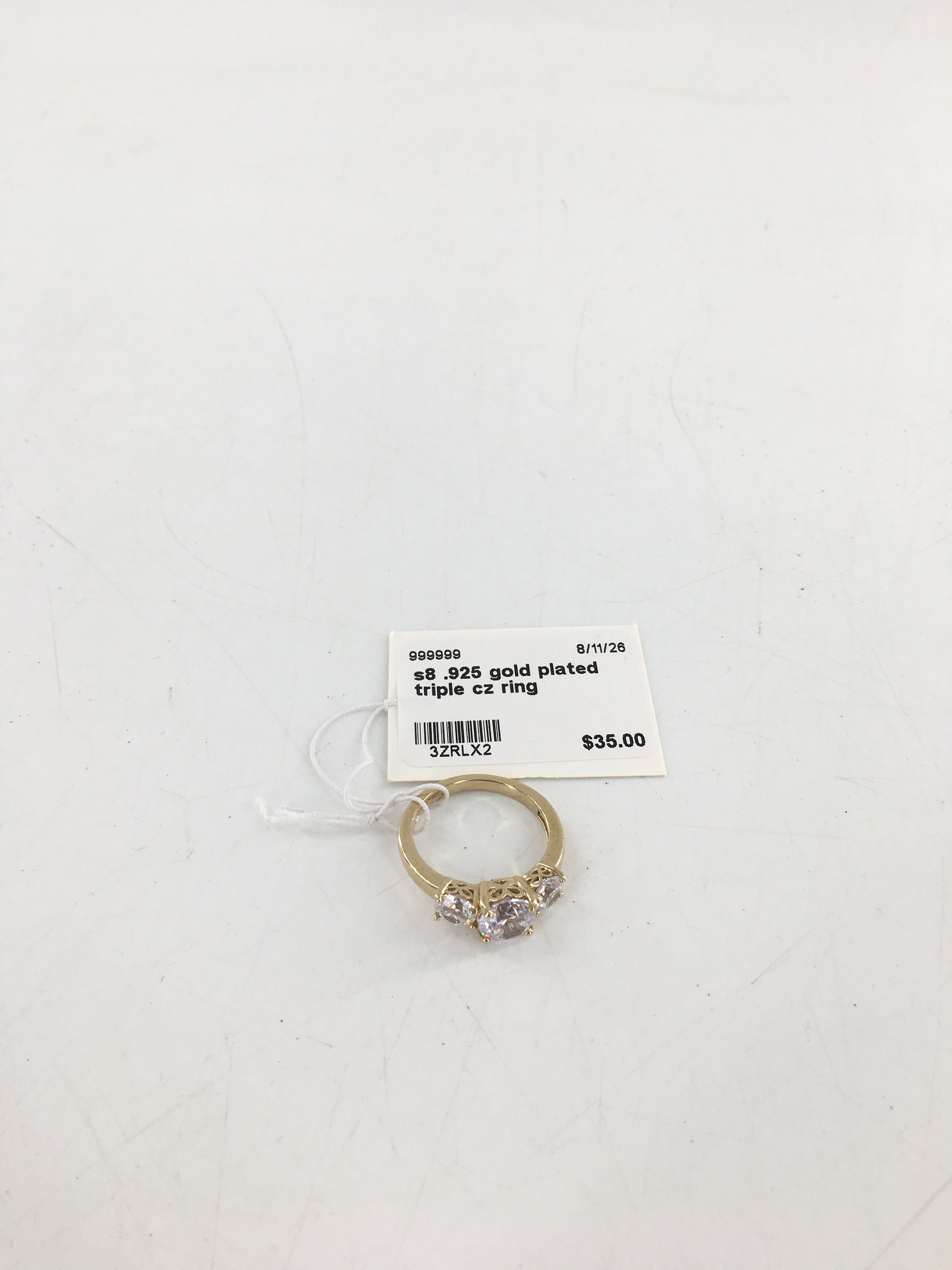 s8 .925 gold plated triple cz ring