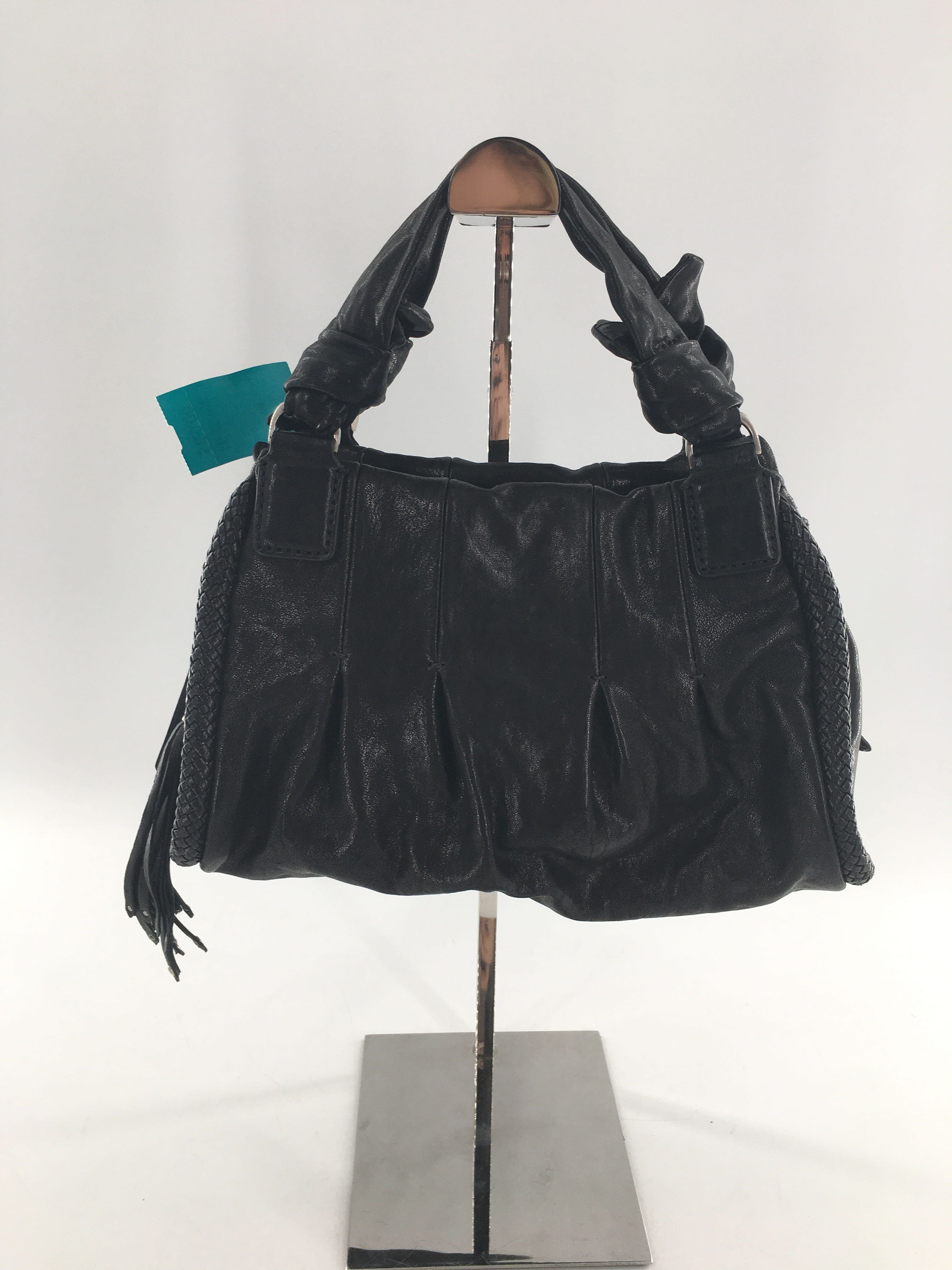 R232 leather tassel handbag