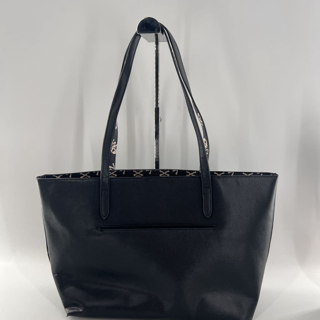 vegan leather skull print accent tote bag