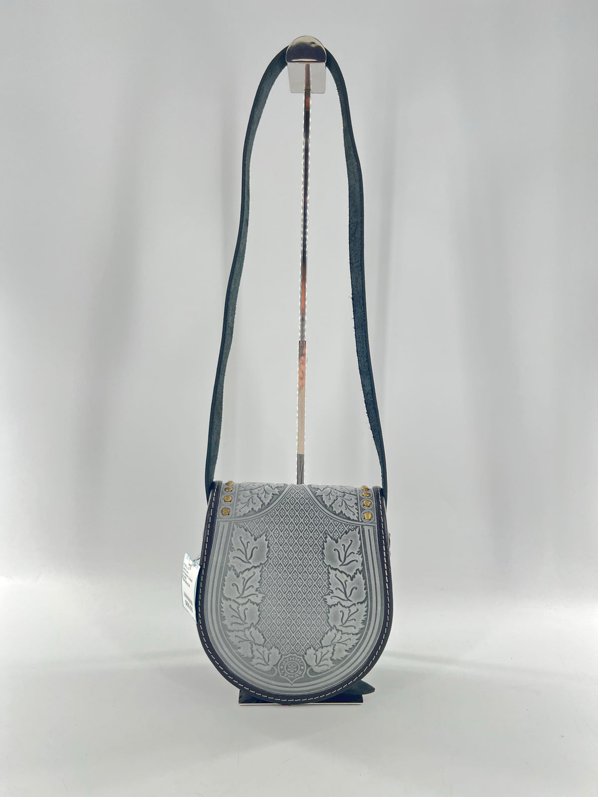 Ukrainian tooled studded turnlock messenger bag