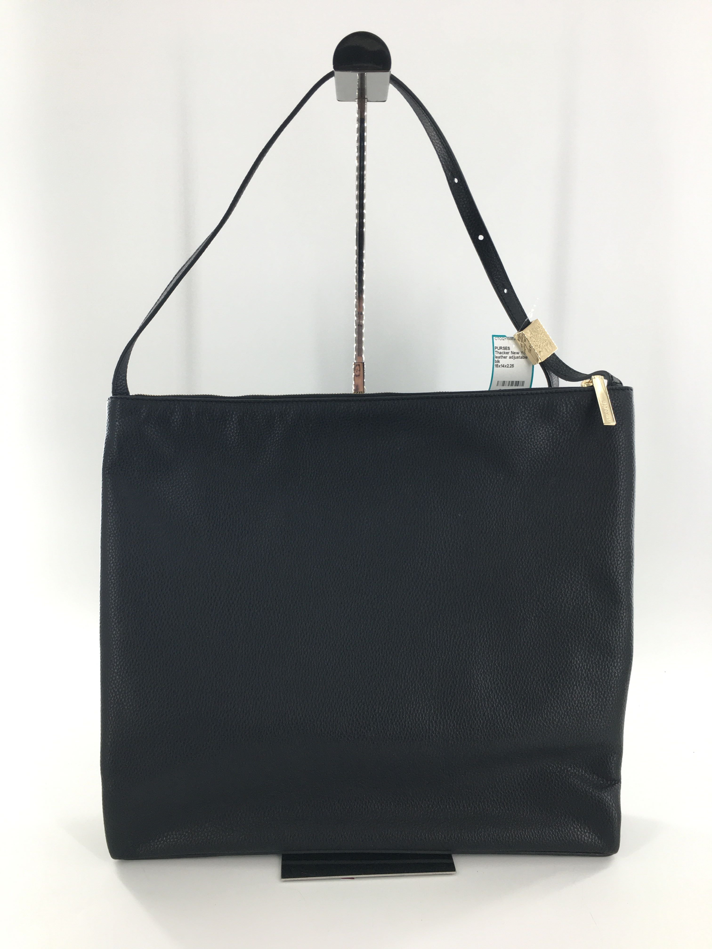 leather adjustable strap crossbody w/ gold tone feather emblem